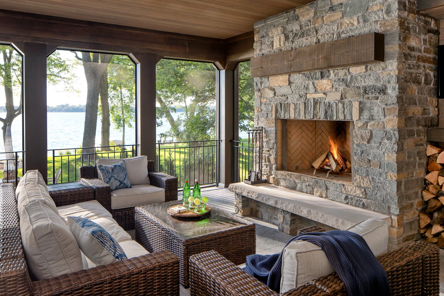 Sunroom stone fireplace on the lake in Buffalo, MN