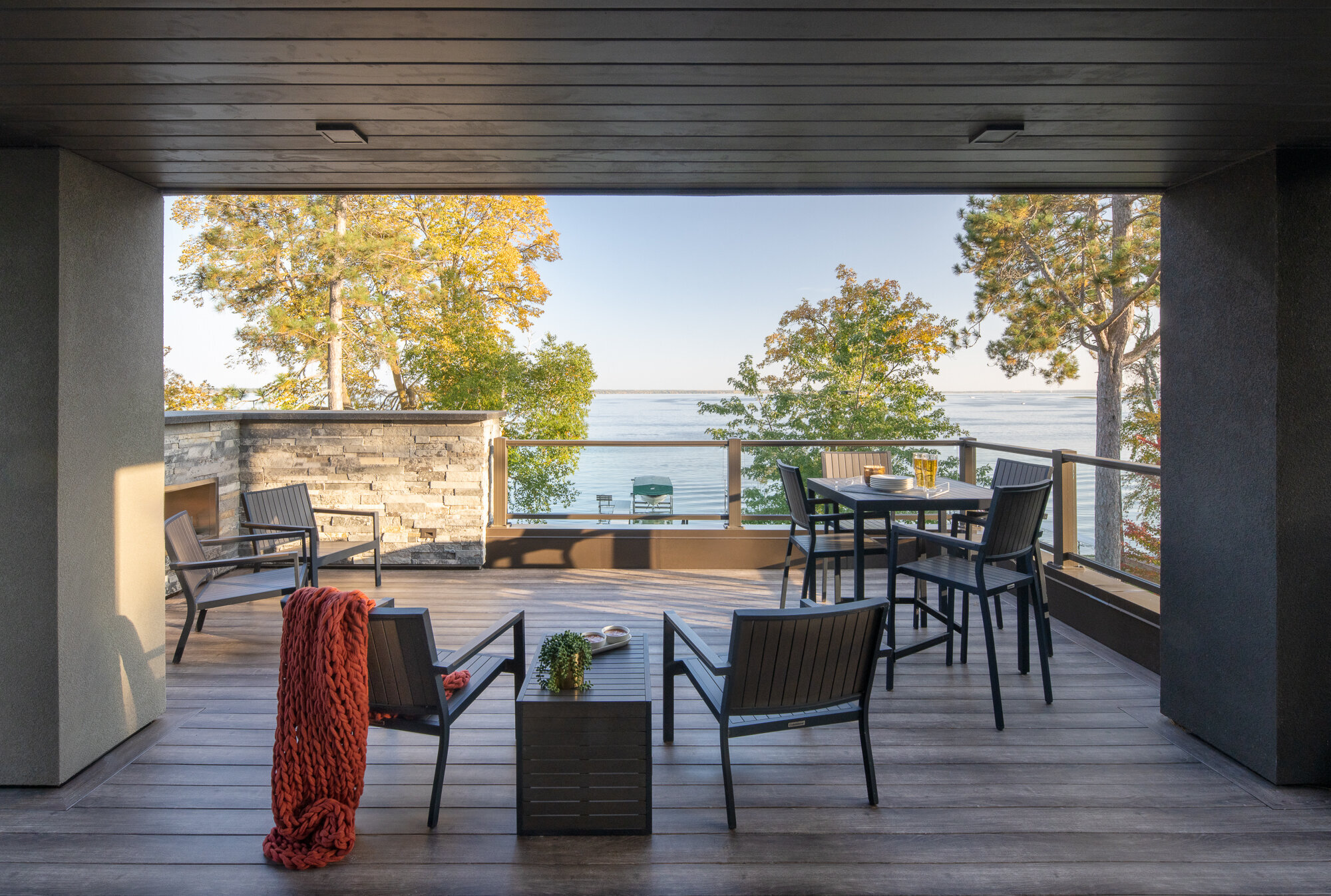 Beautiful balcony overlooking a lake on an autumn evening
