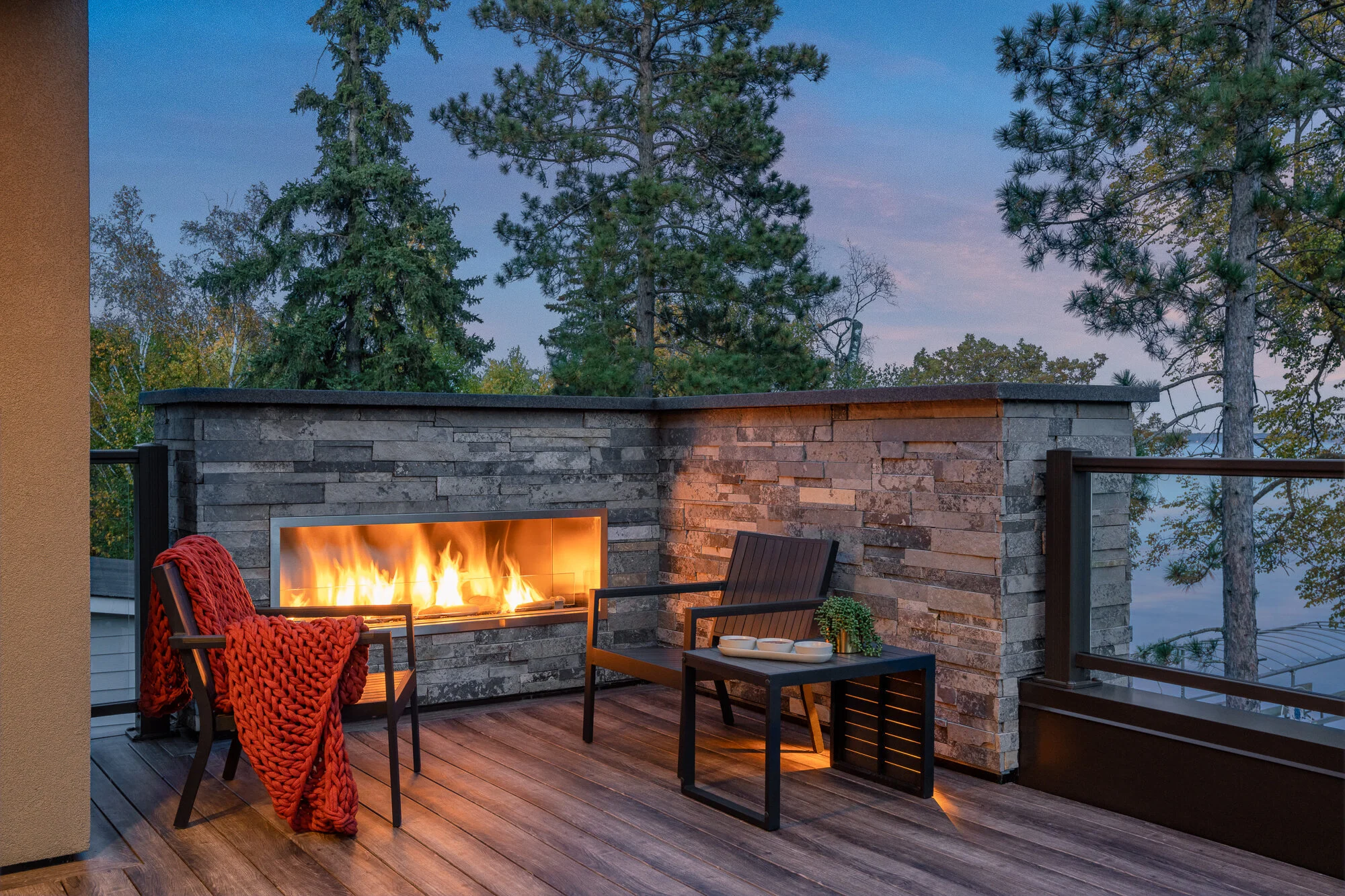 Cozy fireplace overlooking the lake in northern Minnesota on an autumn evening