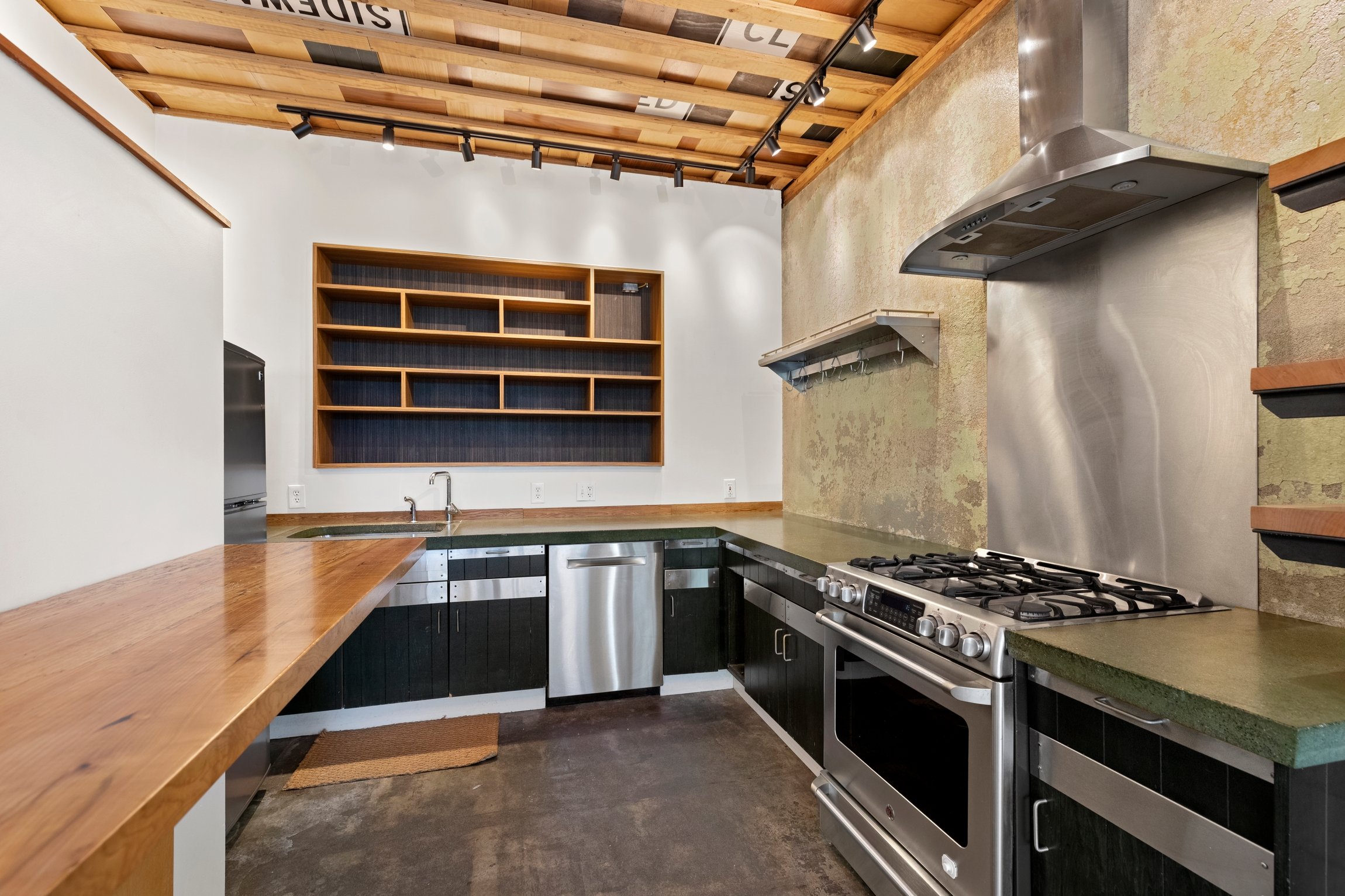 Unique modern touches- with updated counter and fireplace for a finish of warmth.