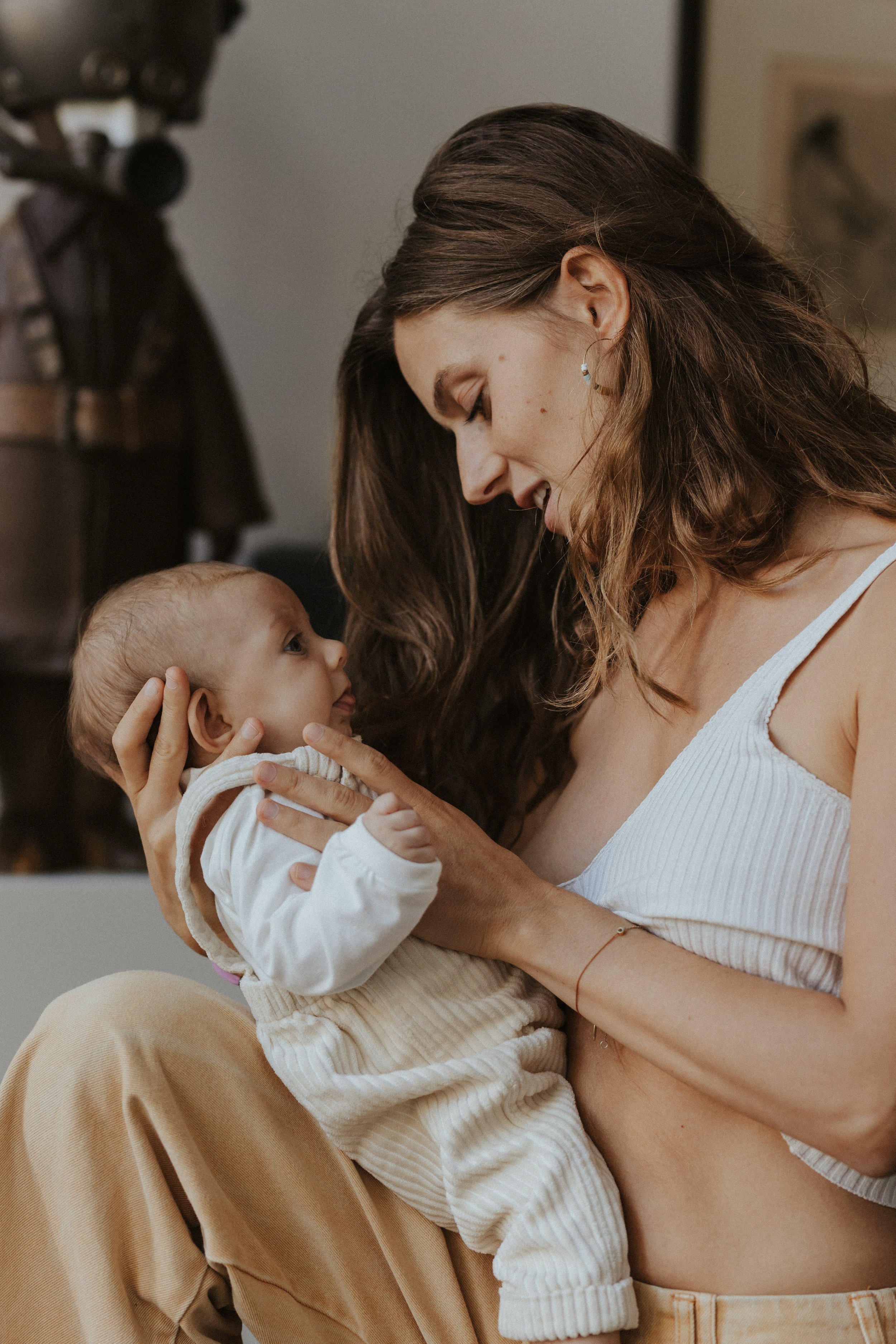 Portret van een mama met haar baby in Gent