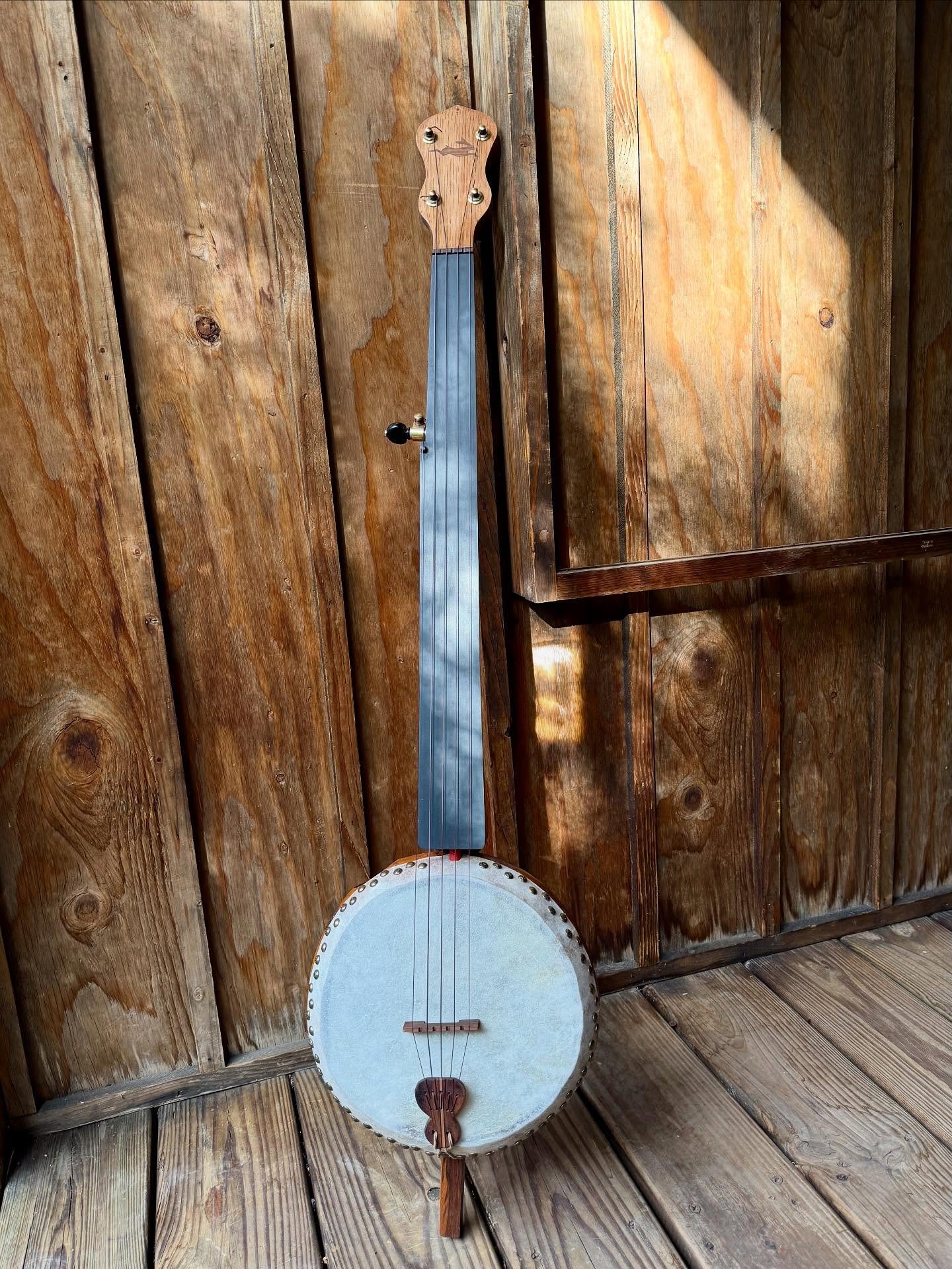 Gourd banjo #11. The neck is Chechen, which is a pretty nice wood to work with, but it smells pretty unpleasant when you cut it.  If you want, go and take a look at it @denverfolklorecenter. She sings beautifully.