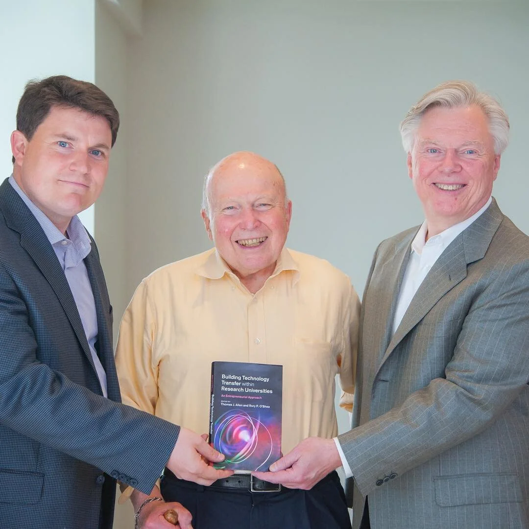 Presenting book to Dean of MIT Sloan