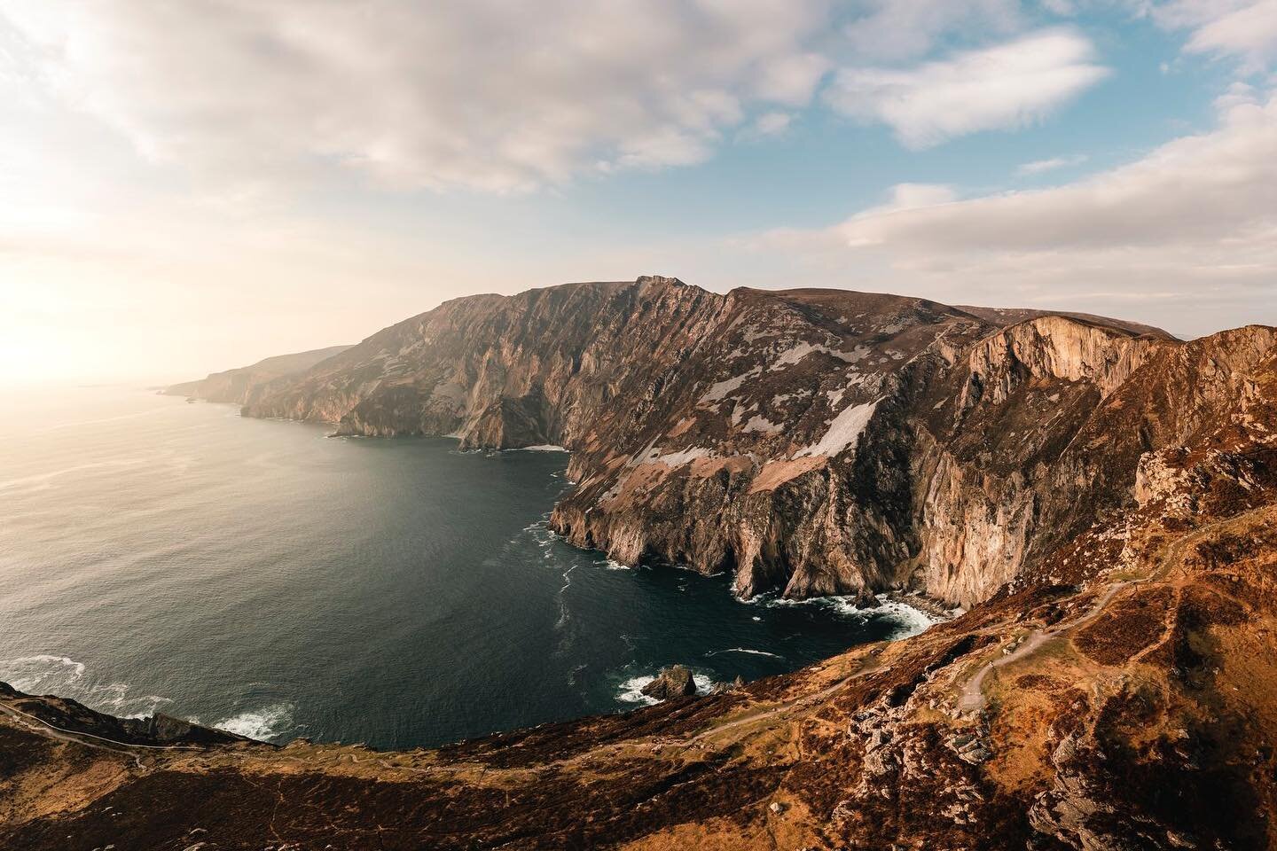 Slieve League Cliffs

Sliabh Liag (Slieve League) is Irish for &lsquo;mountain of stone pillars.&rsquo; These gorgeous sea cliffs, on the west coast of Ireland, rise 2000ft up from the wild Atlantic Ocean.

For years, Sliabh Liag has always felt like