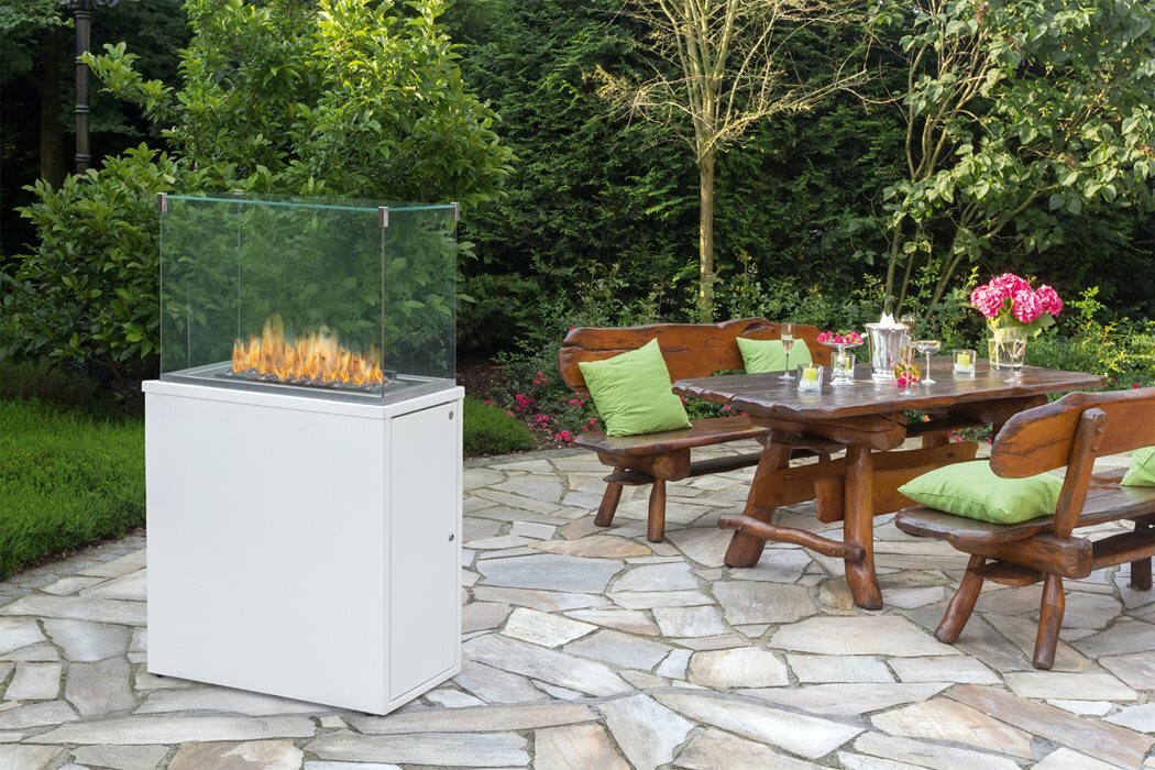 Dru Spartherm Fuora Q-XL firepit in a garden patio
