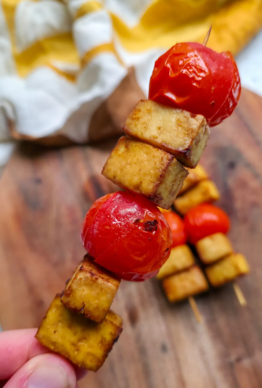 cherry tomatoes and tofu on skewers