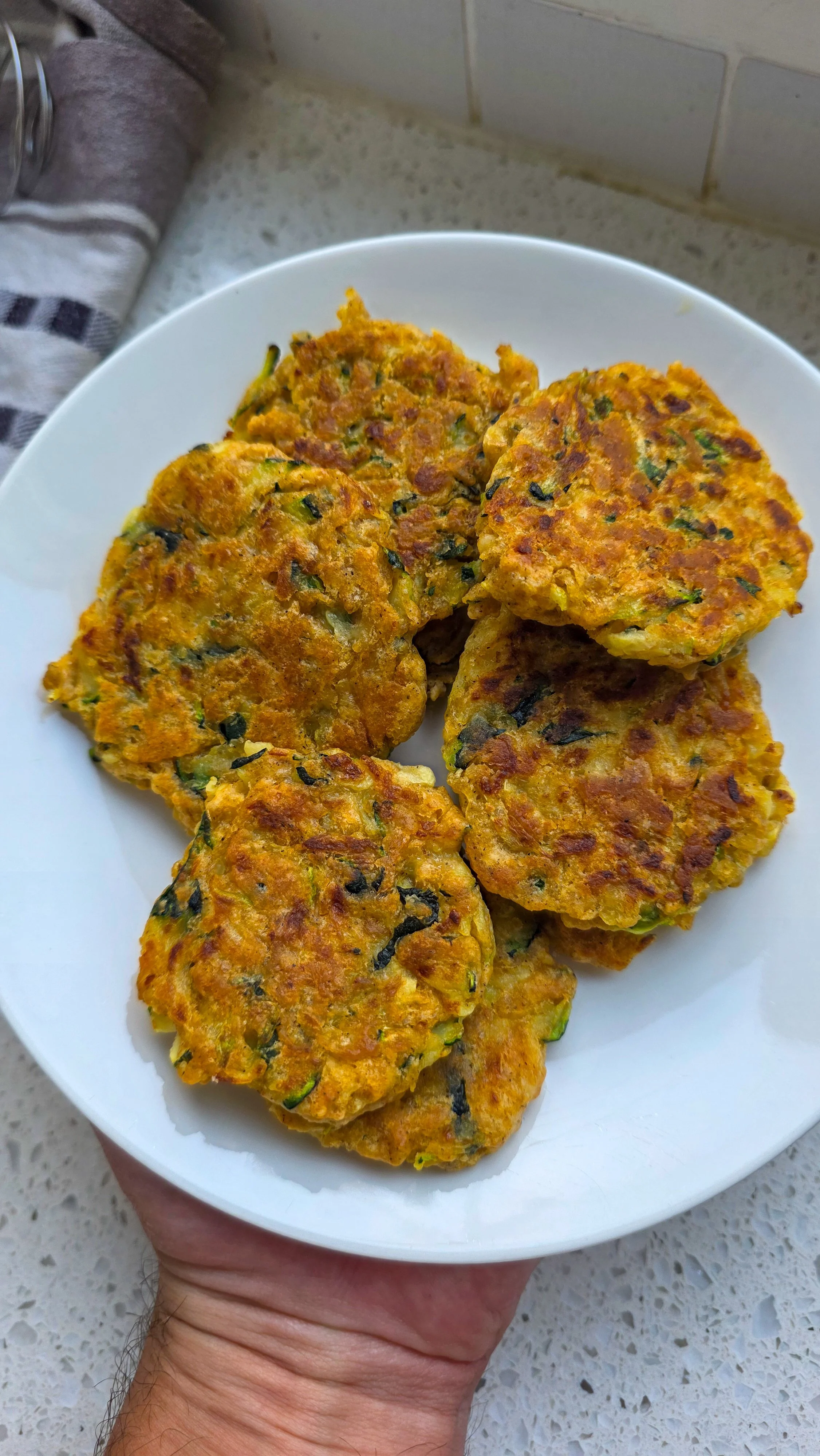 Vegan zucchini fritters on a plate