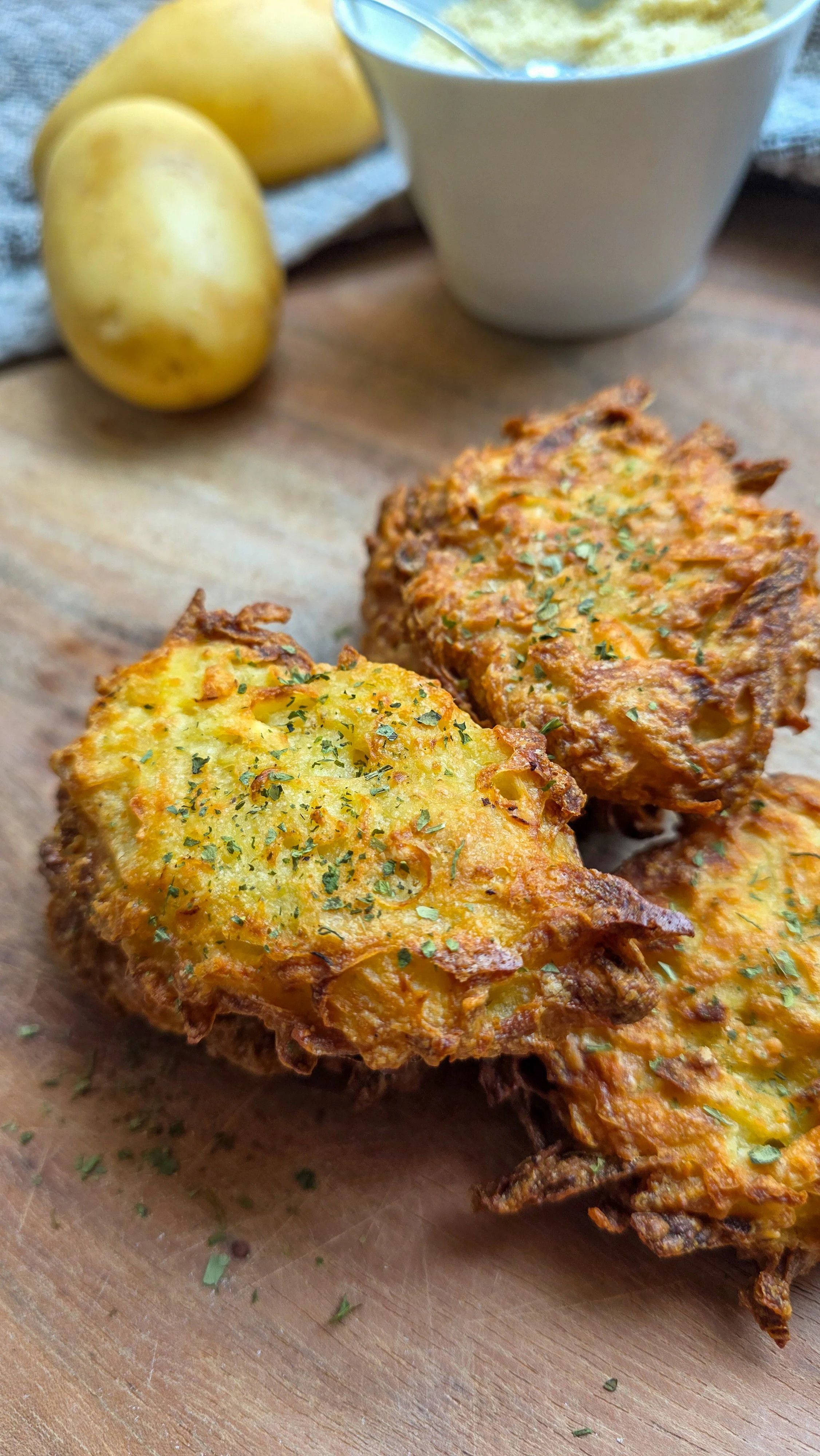 3 hash browns on a chopping board