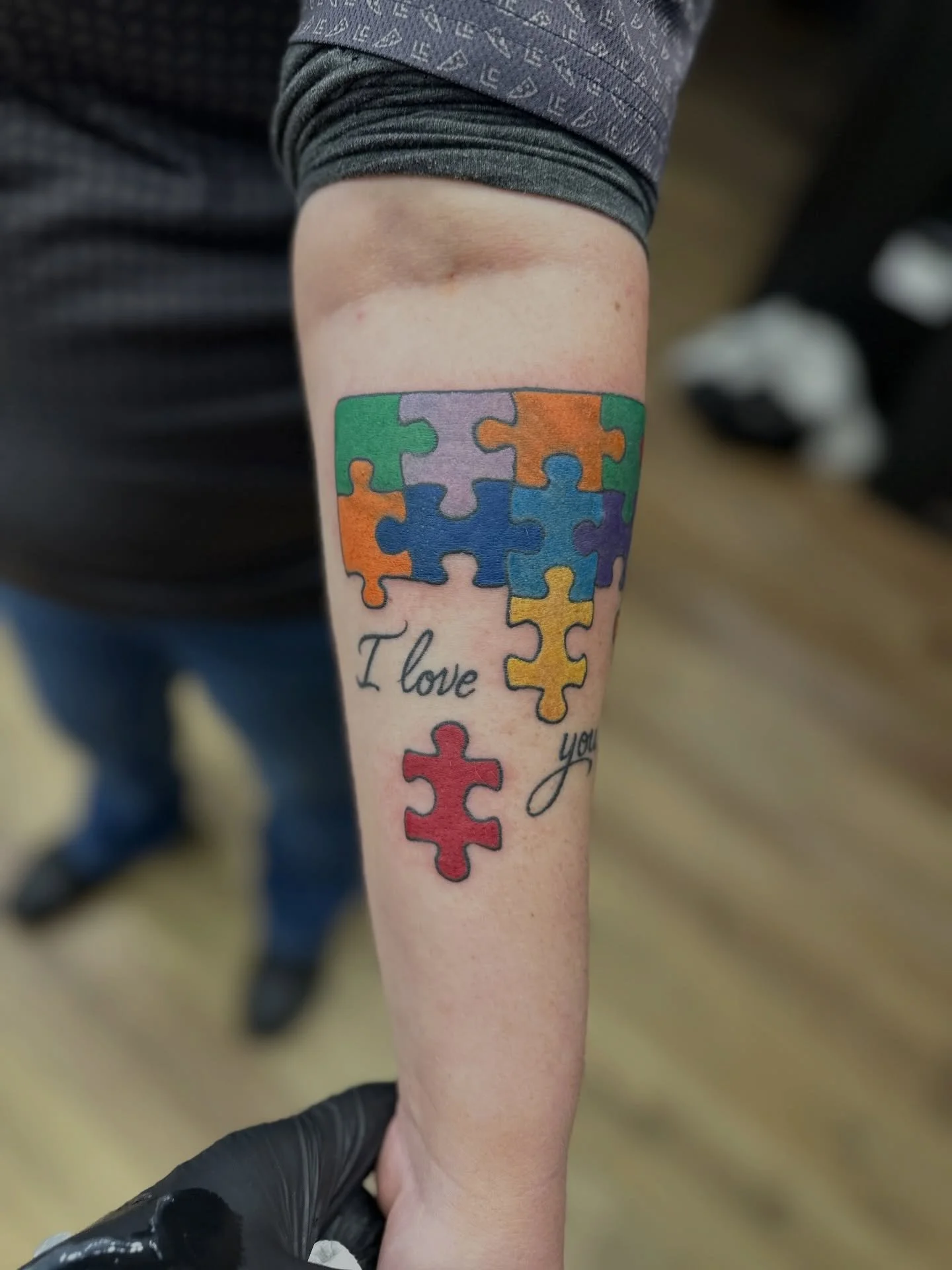 Covered up an old tattoo with an autism puzzle piece design.
