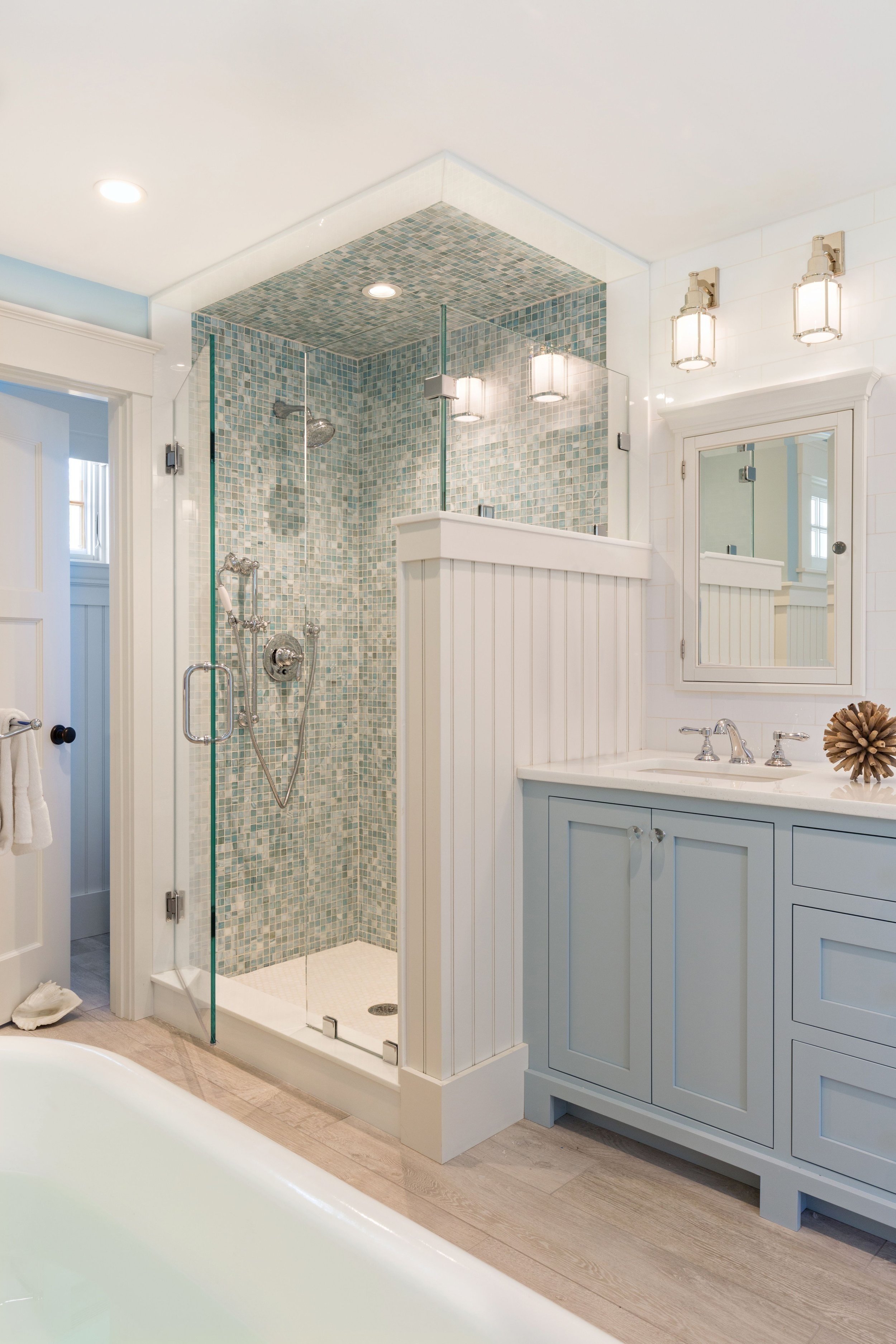 The salty waters of Nantucket Harbor after the fog clears can inform the blue-grey shade of a bathroom vanity. Make it yours with Smoke 2122-40.
