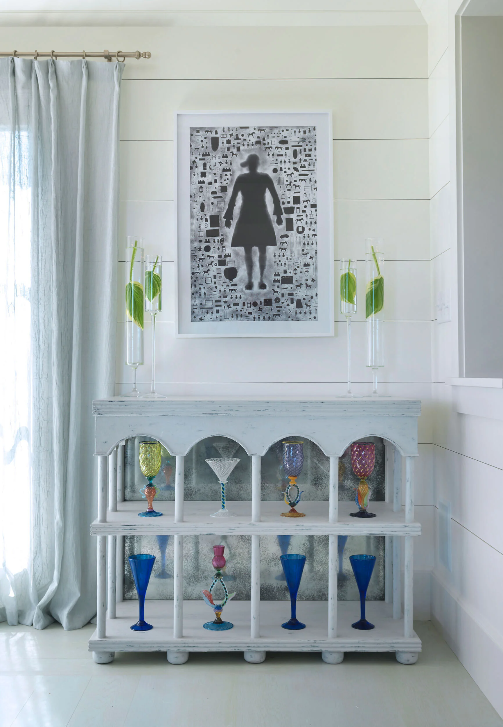White Cabinet Displaying Colorful Glassware in Nantucket Home