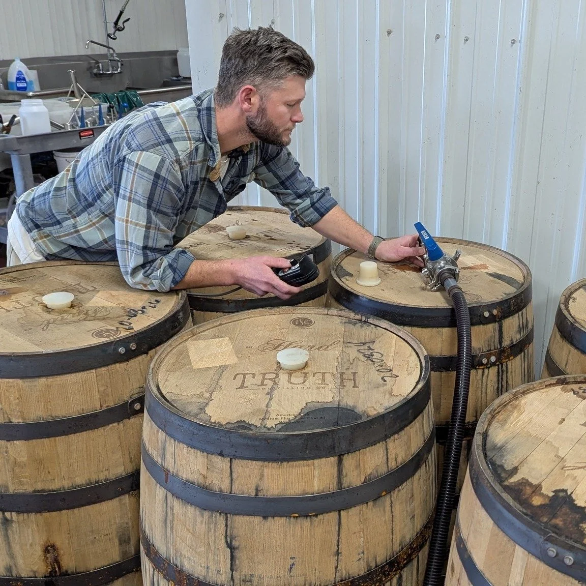 We just filled Hard Truth whiskey barrels with wine and brandy to start aging the next batch of Old Barrel Port!! The wine will age in the barrel and pick up all the good flavors before bottling.  #ILoveBrownCounty