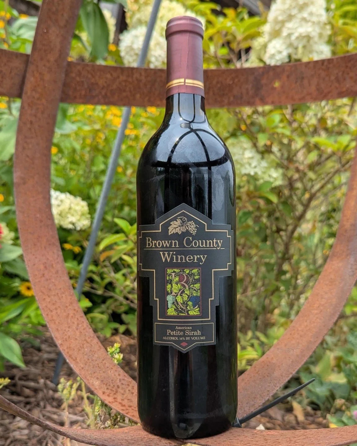 We have a new wine!! The Petite Sirah returns to Brown County Winery with a 2024 vintage.  This is made from whole grapes here at the winery in Gnaw Bone. Fruit forward, yet still tannic, this dry red wine is great for hearty meals and celebrations.

