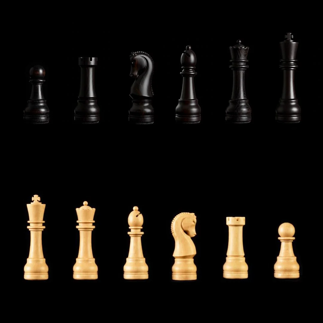 chess pieces ebony self moving chess board 1080x1080.jpg