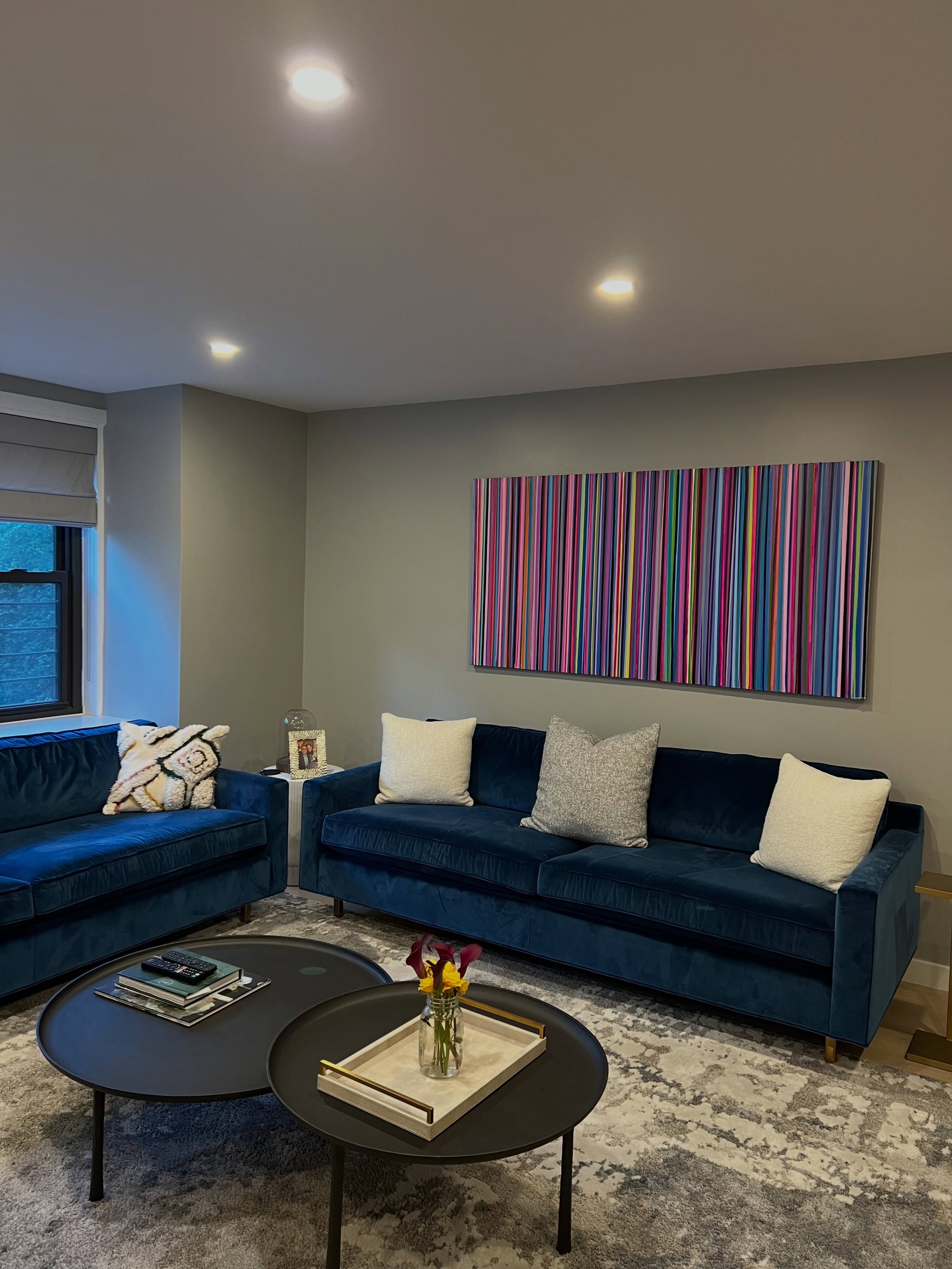 There&rsquo;s nothing quite like seeing a painting in the home it was made for. 💙

I love how this piece brings so much color and energy to the room while still working beautifully with the deep blue sofas and softer, neutral tones around it.

That&
