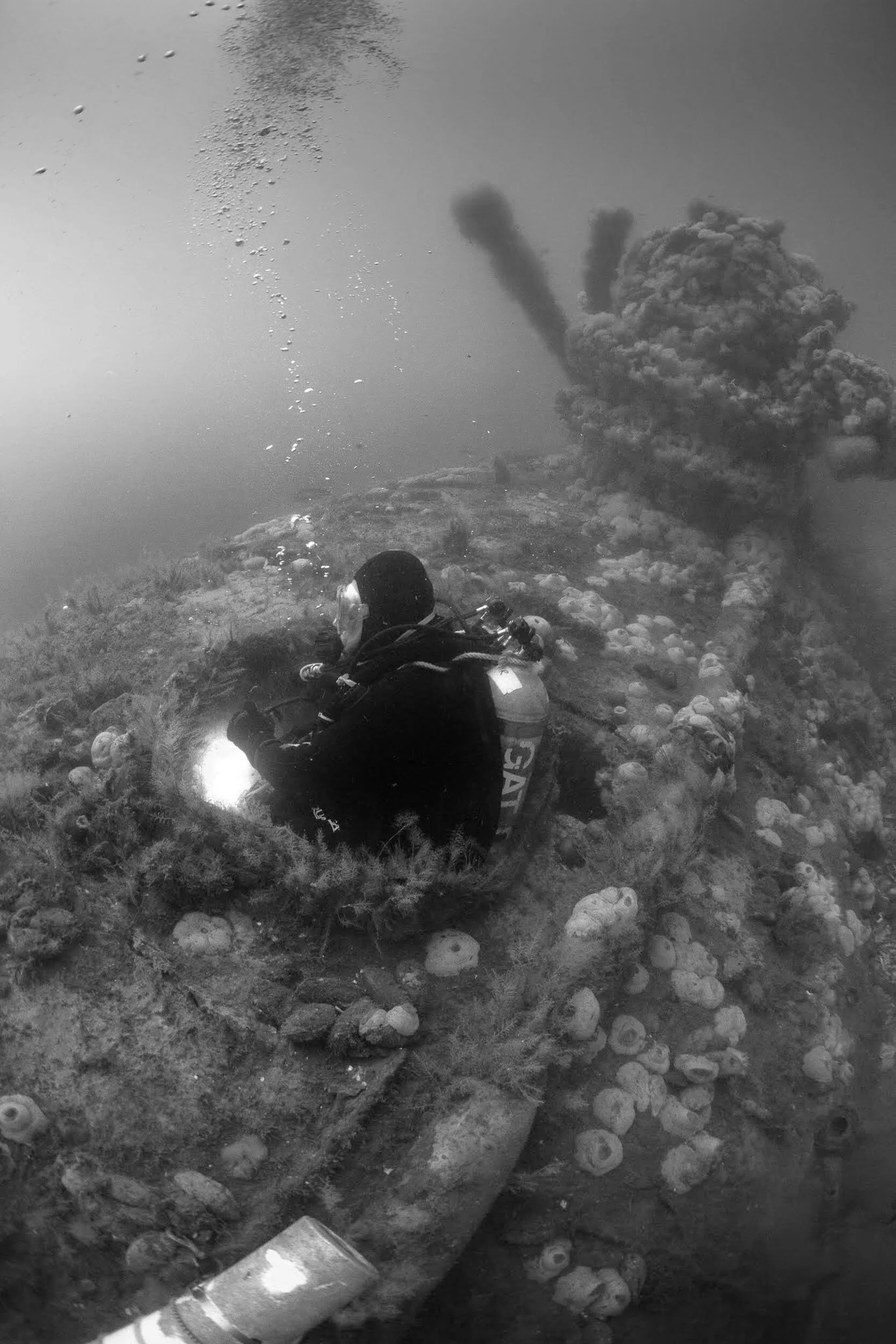 Steve Gatto descends through the Crews Quarters hatch on the S5 Submarine in 155'
