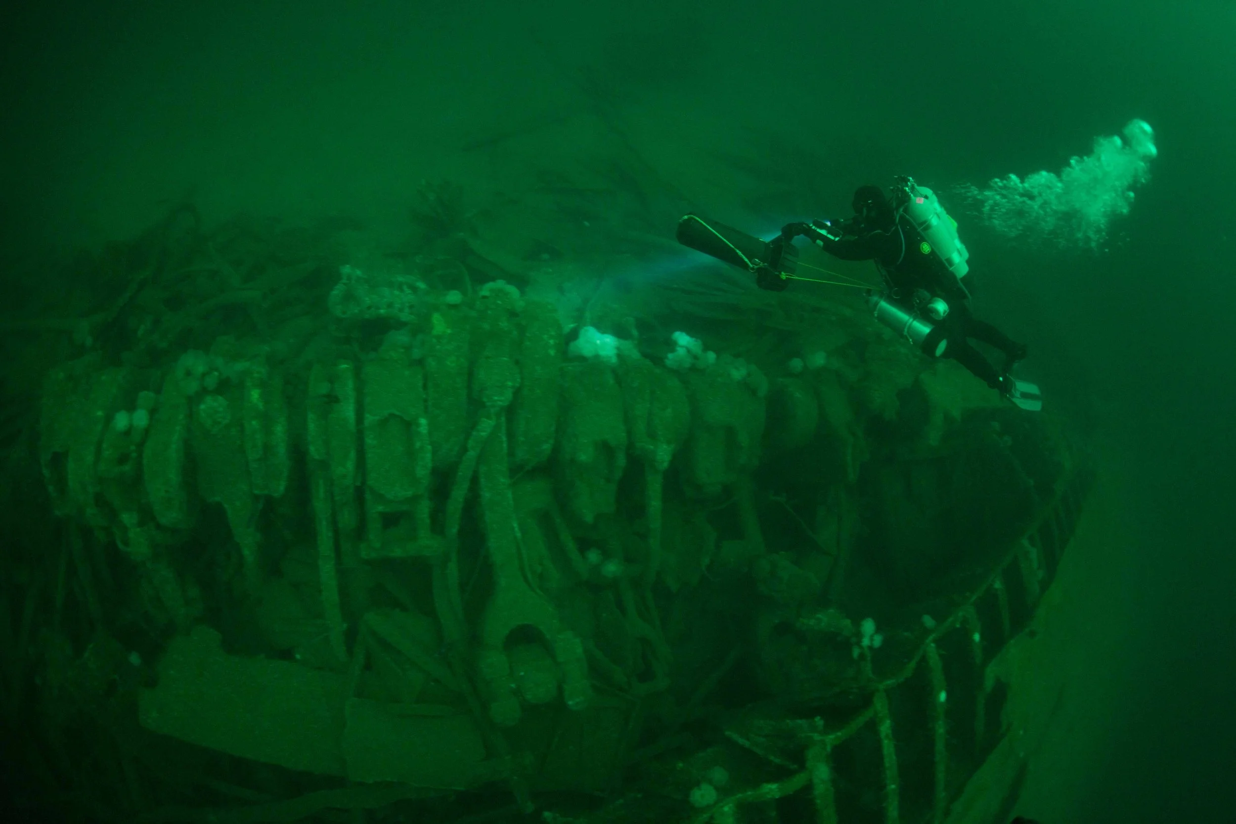 Brian Sullivan cruises over the exposed engine of the SS Merida on a reconnaissance mission for Herbo Humphries.  