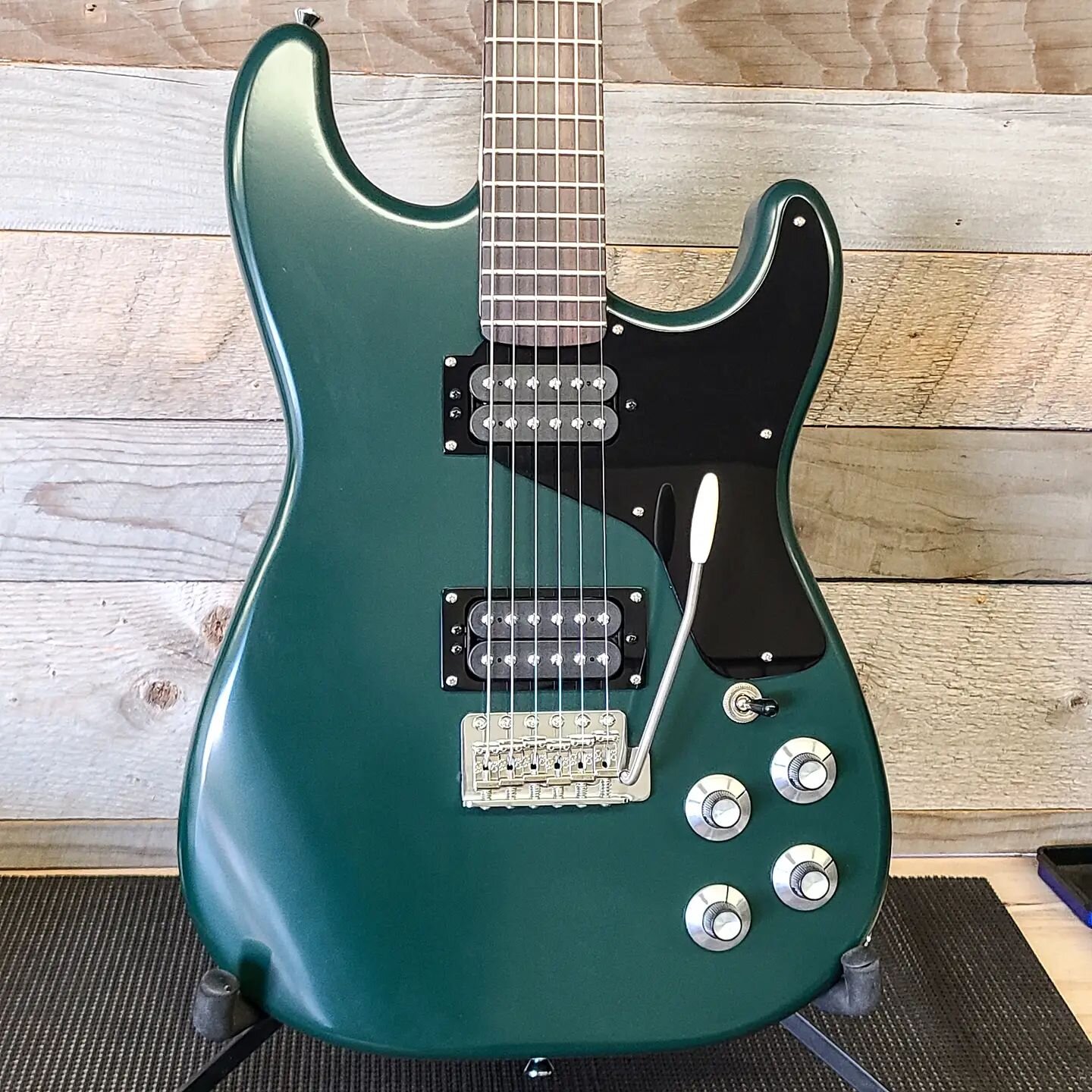A new guitar is born. Doesn't have a model name yet. Specially made for @whisky.pete I'm really happy with how things turned out. British Racing Green and Black - The SG style control layout and pickguard with integrated pickup ring. Callaham bridge,