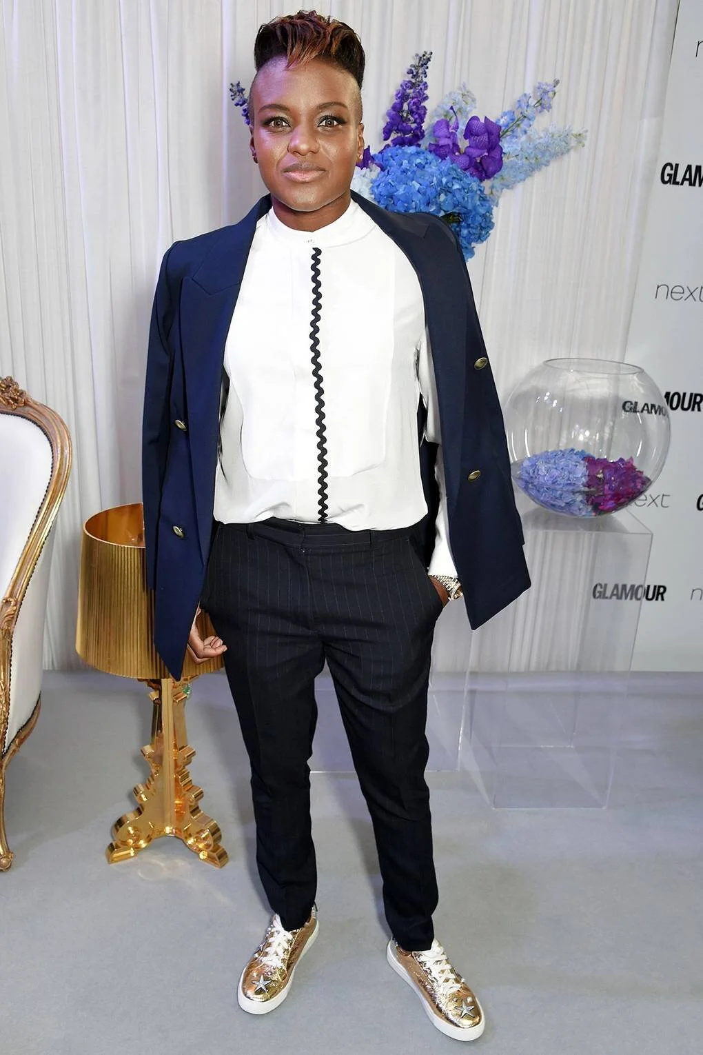 Olympic and Pro Boxer Nicola Adams styled for the GLAMOUR UK Awards red carpet styled by Haili Pue, voted Best Dressed of the night by GLAMOUR's Editor-In-Chief. 