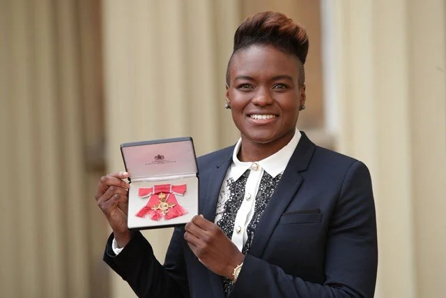 Olympic and Pro Boxer Nicola Adams receives her OBE from the Duke of Cambridge at Buckingham Palace, styled by Haili Pue
