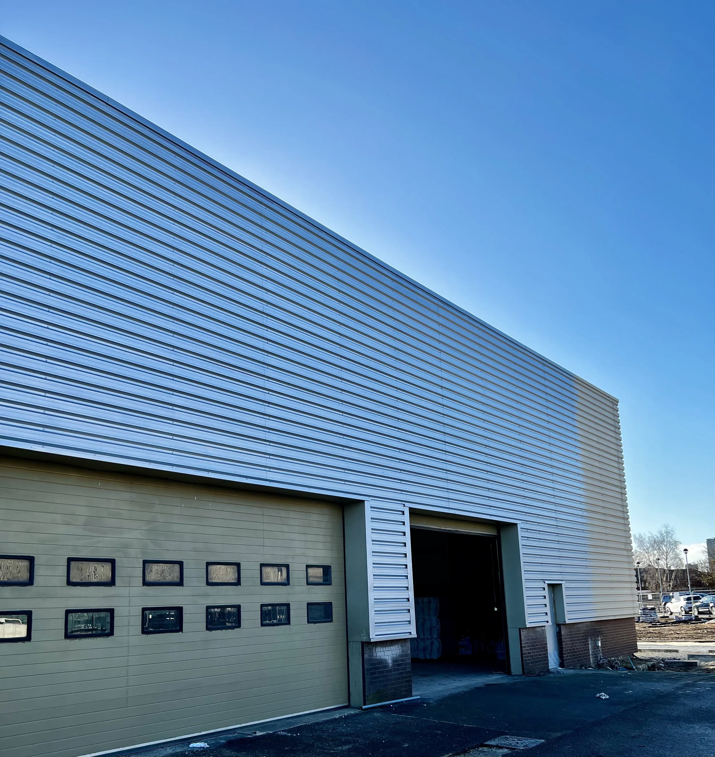 Land-rover Sheffield metallic Finnish to existing  beige cladding 