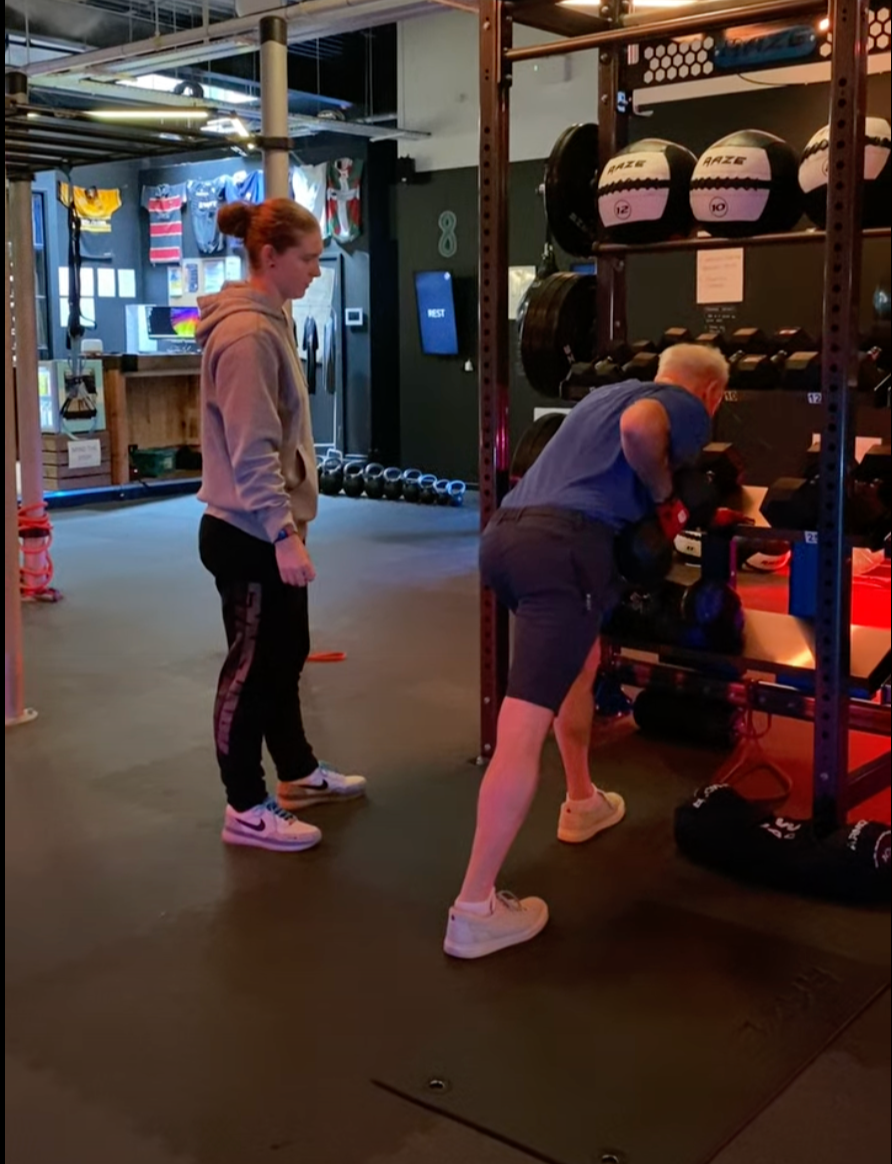 MegaBox Personal Trainer with client