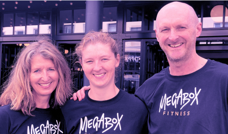 Image of the three Megabox coaches / owners smiling at the camera.