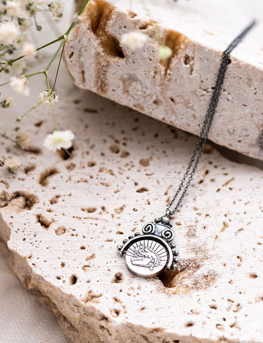 antiseptika-half-frame-spin-pendant-black-romy-mittelman-lifestyle.jpeg