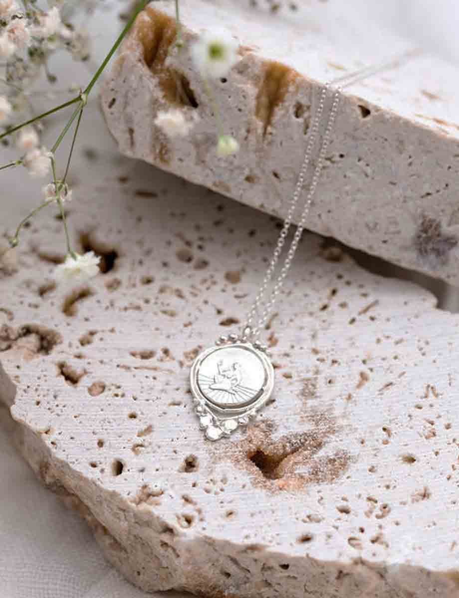 veritas-full-spin-pendant-silver-romy-mittelman-front.jpeg
