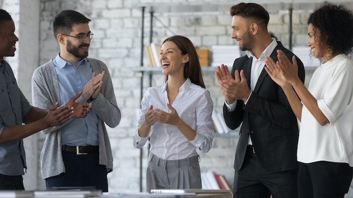 Do This One Thing To Boost Your Feel-Good Hormones 2 Celebrating+Coworker+Copy