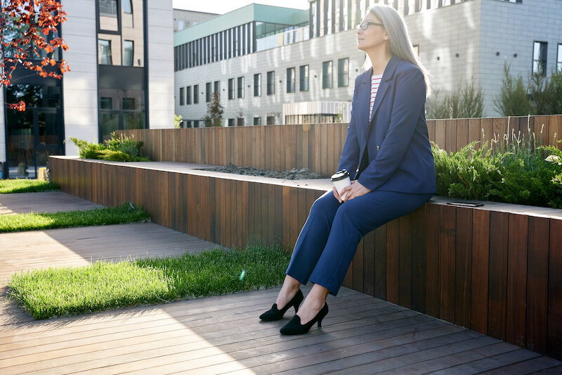 Stressed? My Top 25 Easy And Free Tips To Start Today 1 Executive Woman Taking Break Outside.jpeg