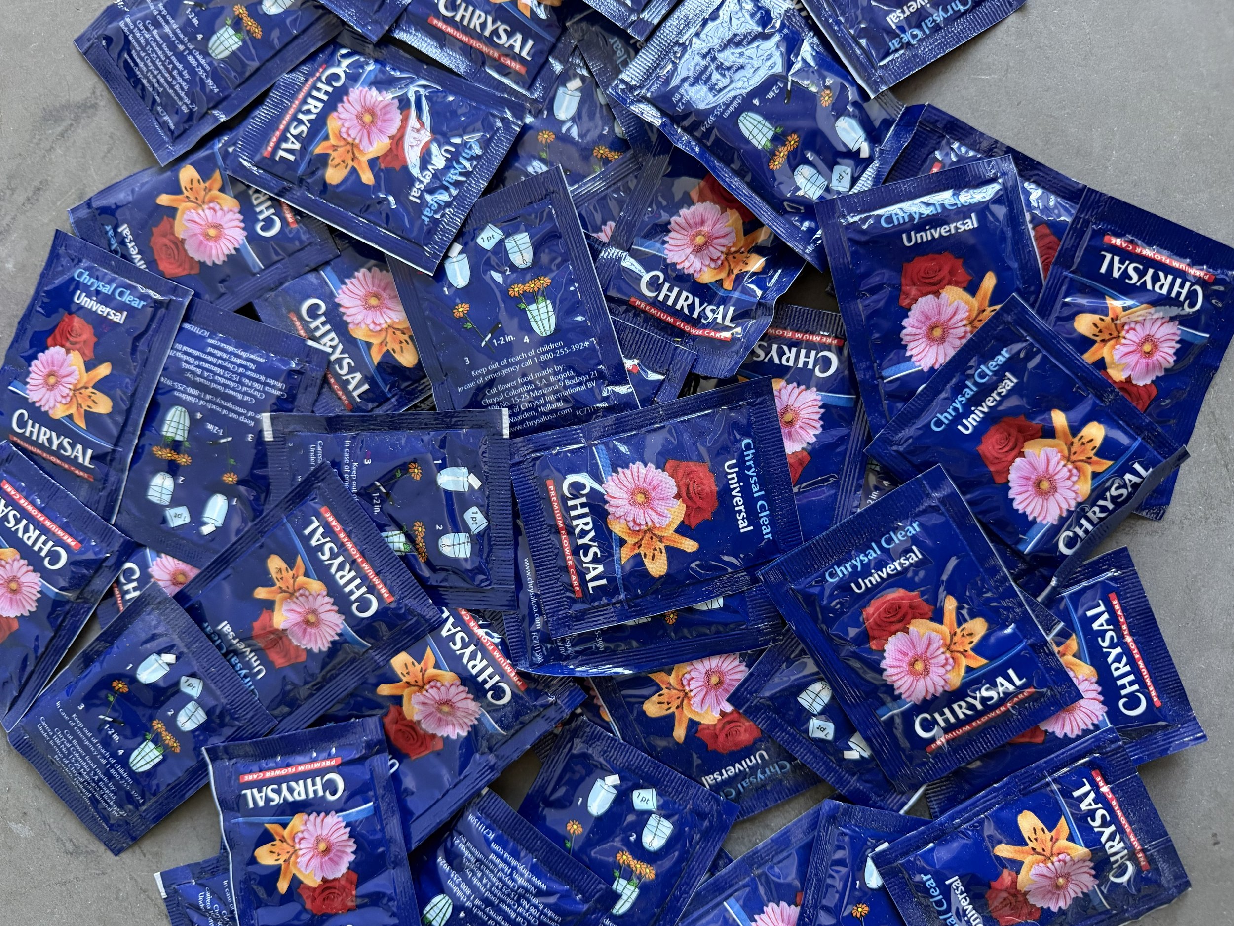 What's Really in Those Little Packets of Flower Food?