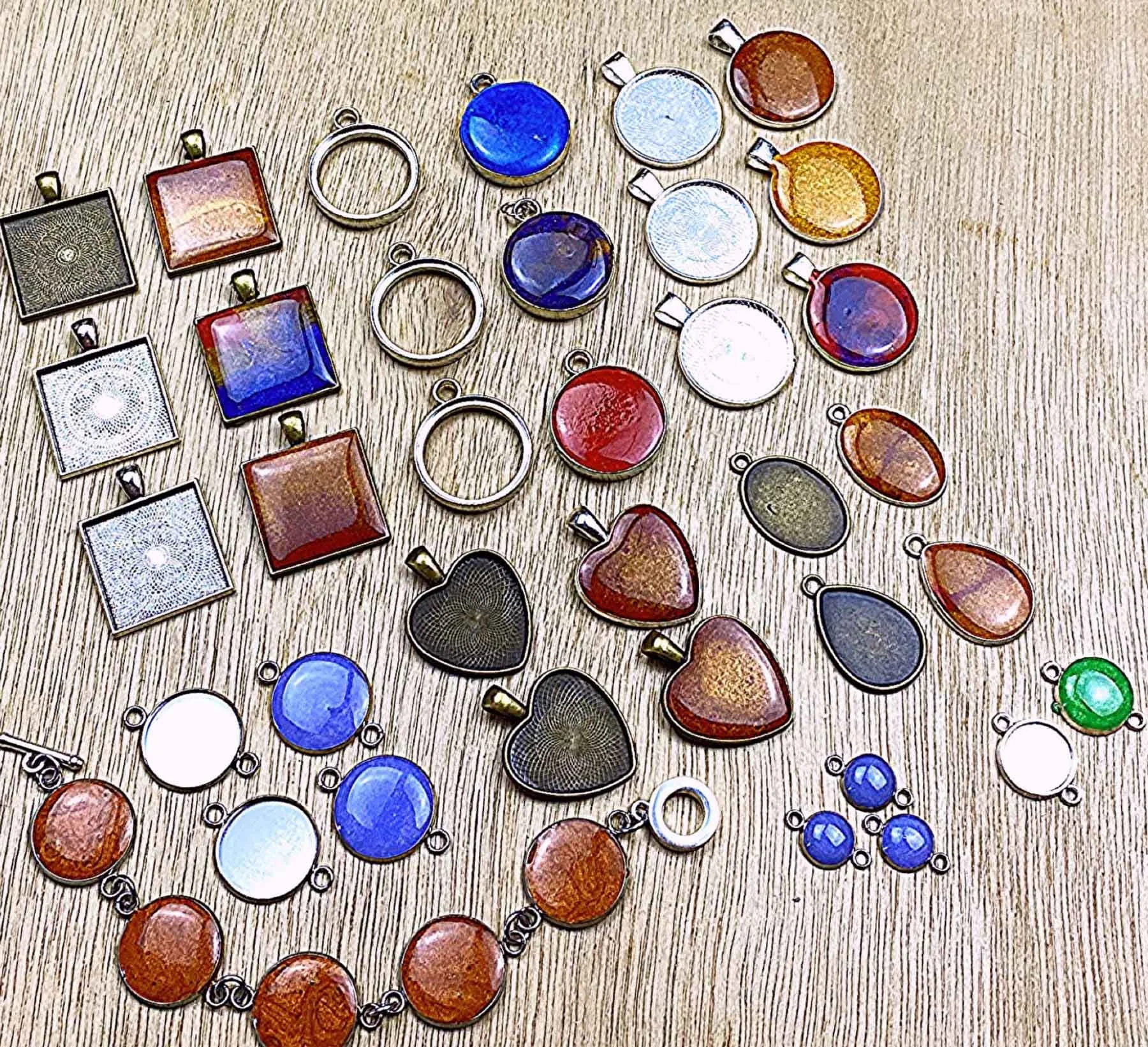 resin jewellery bezels in various stages of completion