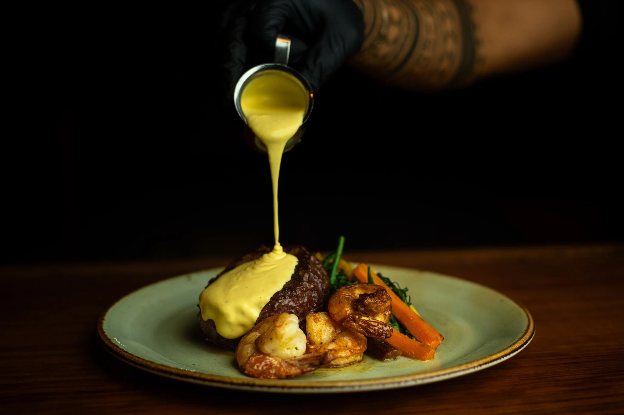 🥩 Surf &amp; Turf Perfection: Steak and Shrimp 🍤

Treat yourself to the ultimate dining experience! Our 6oz pan-seared NY striploin pairs beautifully with succulent grilled shrimp, all drizzled in rich garlic butter. Served with creamy mashed potat