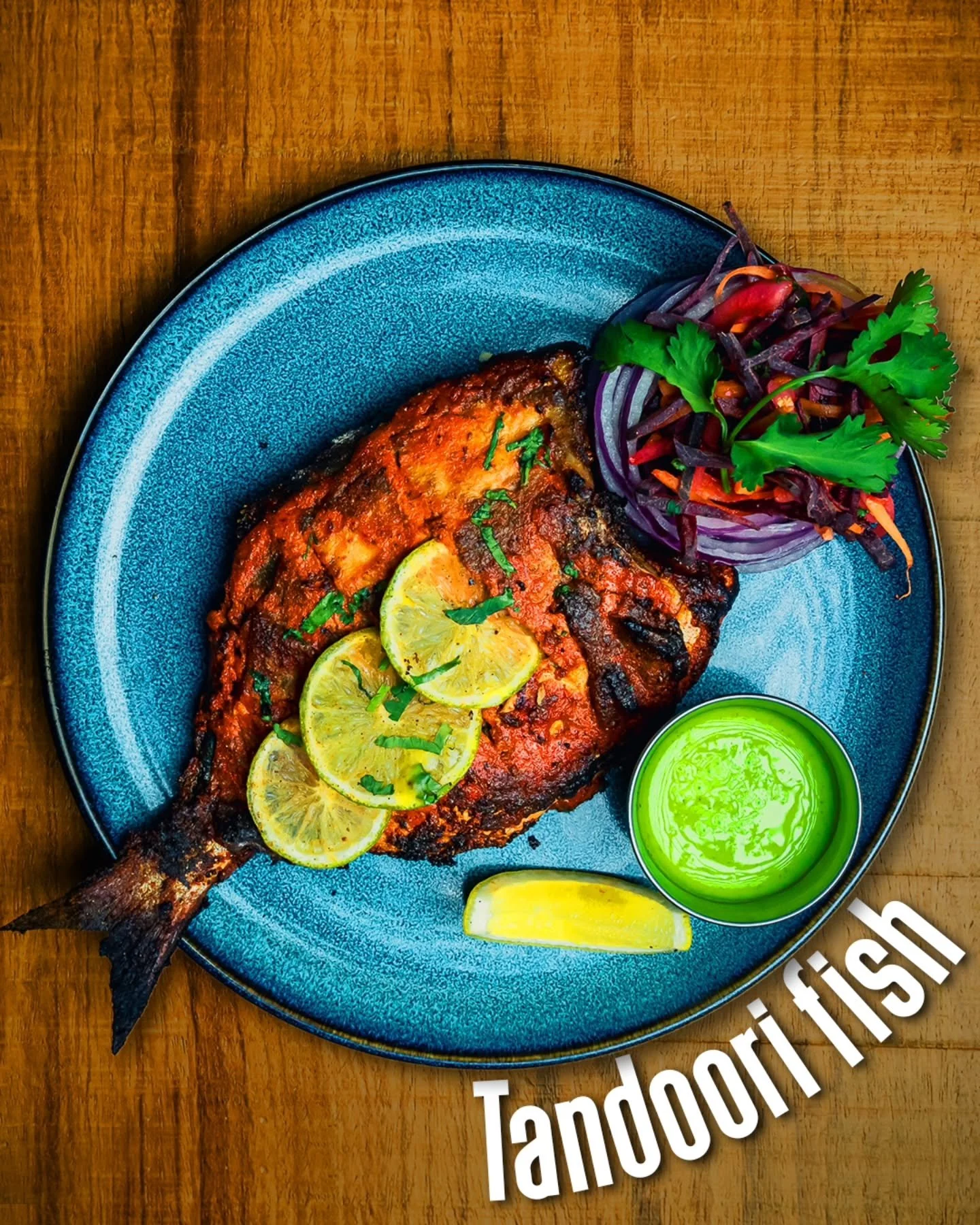 Tandoori Fish &mdash; fire, flavor, and finesse on a plate

Marinated in bold spices, slow-cooked to perfection, and finished with that signature smoky char.
Every bite is rich, juicy, and full of depth&mdash;balanced with fresh citrus and vibrant si