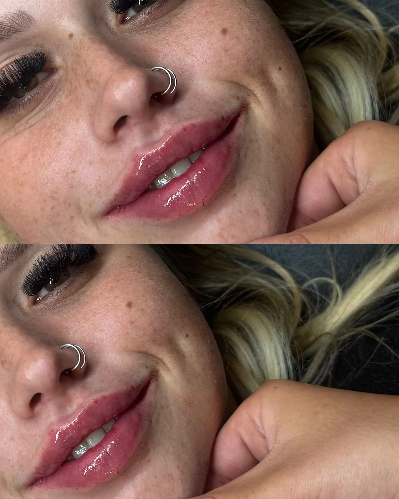 Close-up of a woman's face showing her eyes, nose, lips, and part of her hand. The woman has freckles, a silver nose ring, and glossy lips.