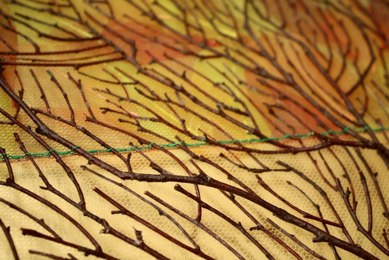 Inside Out (2025). Dried birch twigs, skeletal leaves, metallic thread. 40cm x 40cm. 