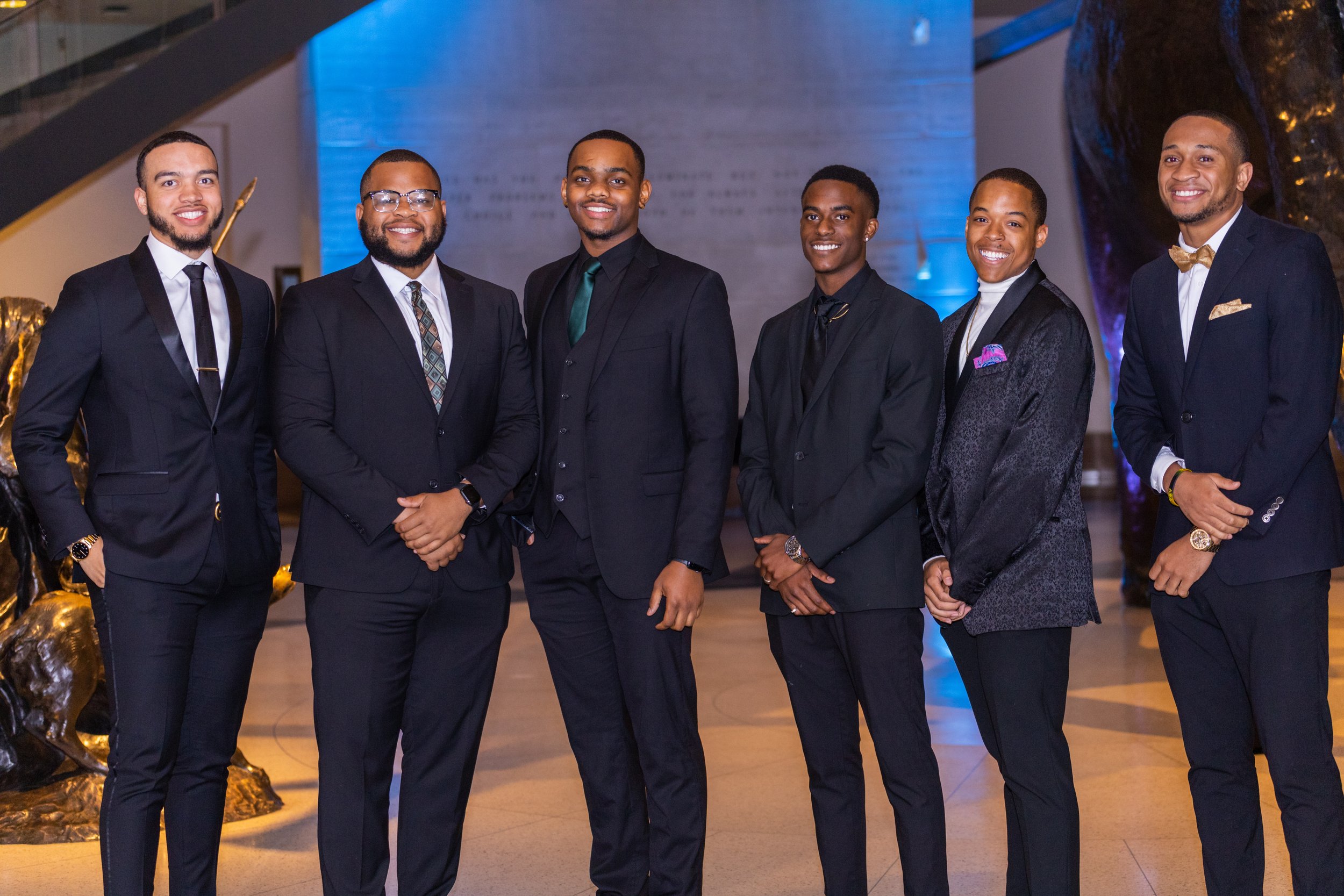 corporate event photography or men in their black suit