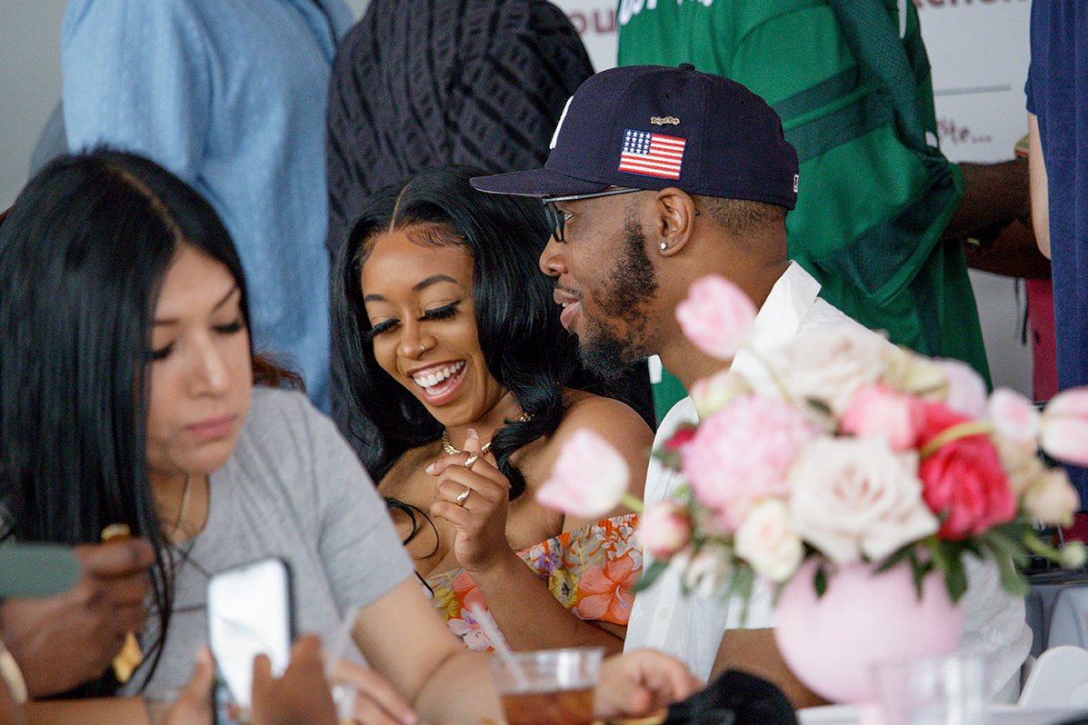 Baby shower event photography of smiling guests 