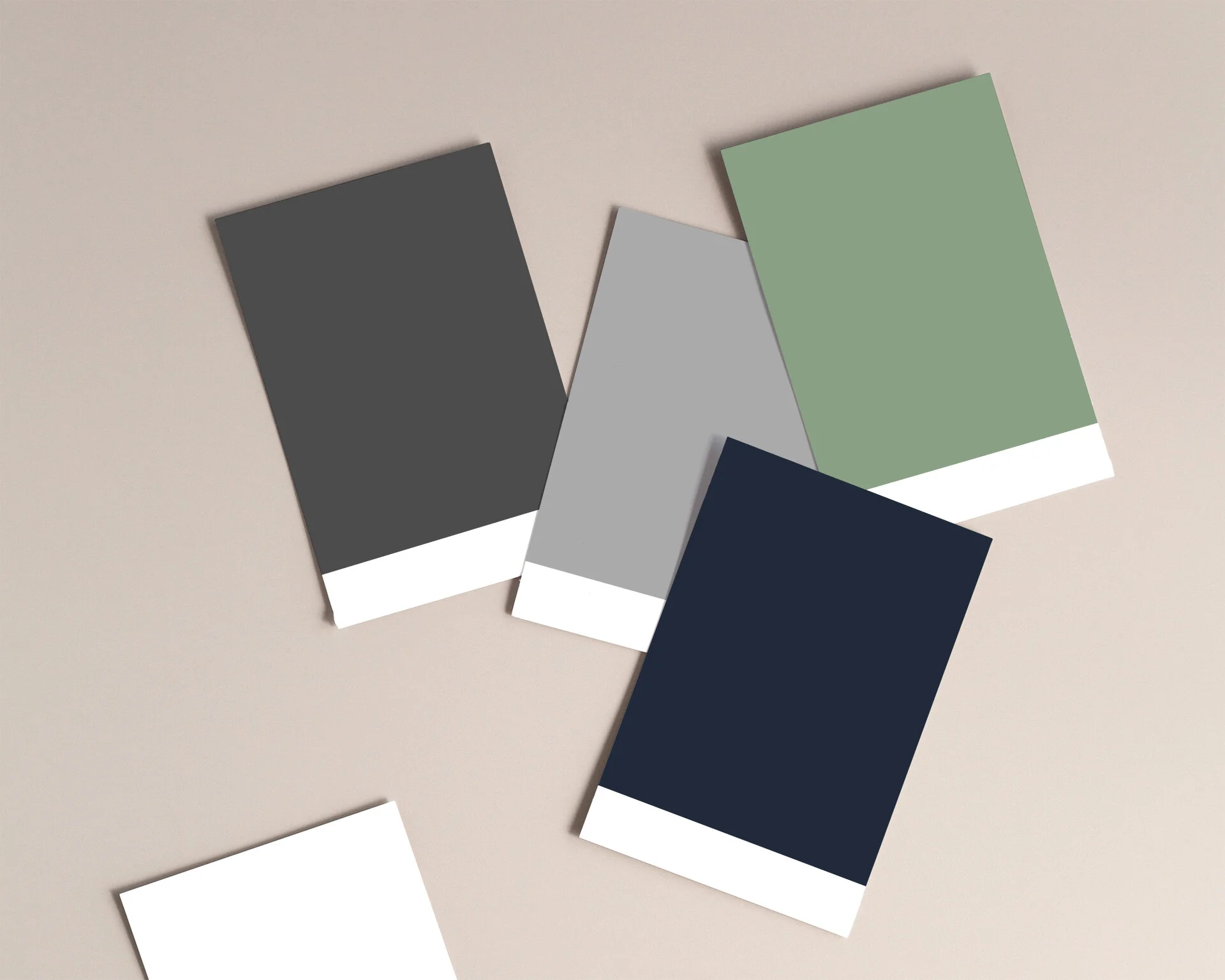 Assorted color swatches with white borders on a beige background.