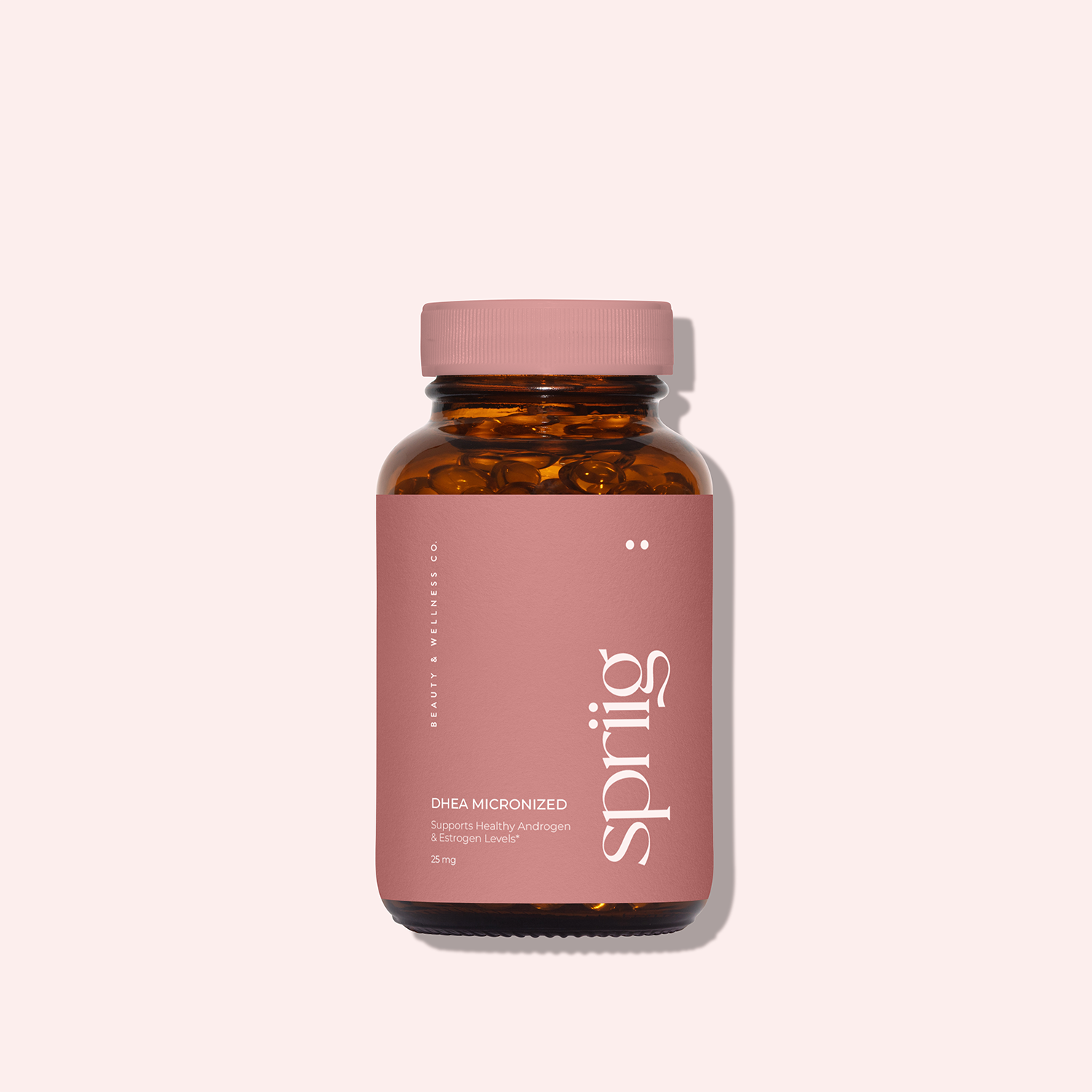 A bottle of dietary supplements with a pink label and pink cap, containing capsules, on a light pink background.