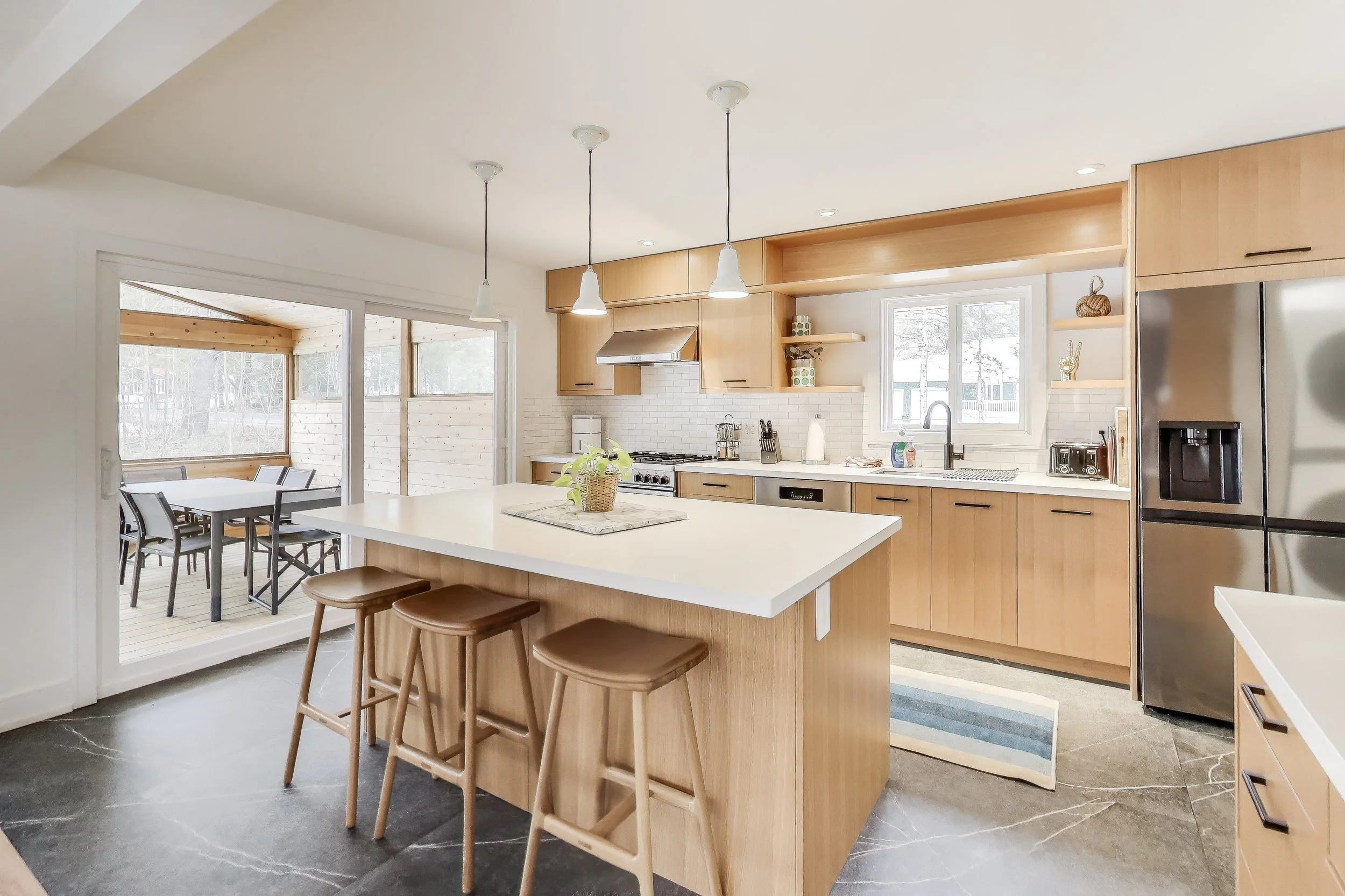 Fully equipped kitchen in Muskoka A-frame cottage with modern appliances, spacious countertops, and everything you need to cook and entertain while enjoying lakefront living in Ontario’s cottage country.