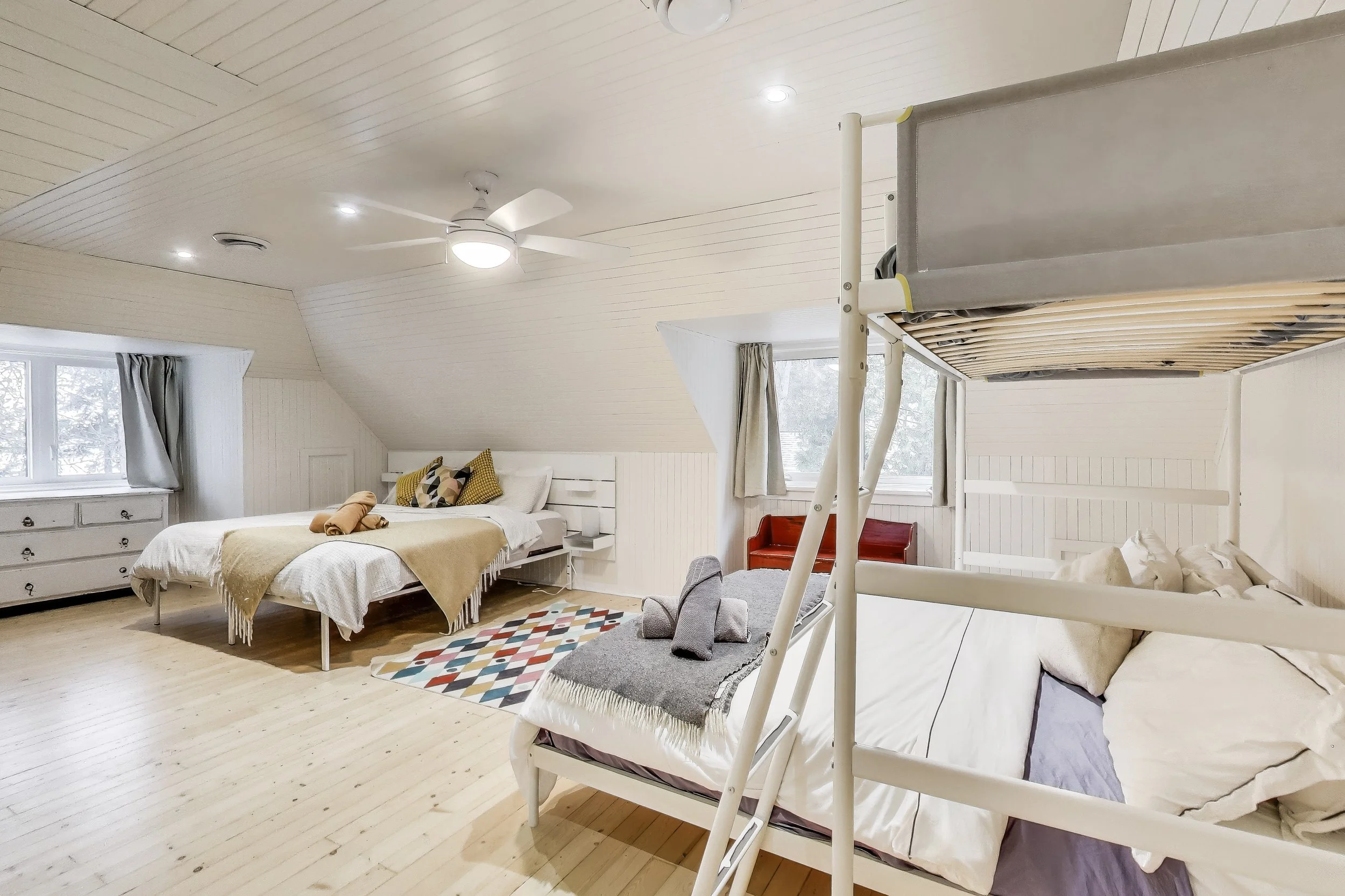 Fun and cozy kids' bedroom, designed for comfort and play—perfect for restful nights after a day of golf or lakefront activities in Ontario’s cottage country.