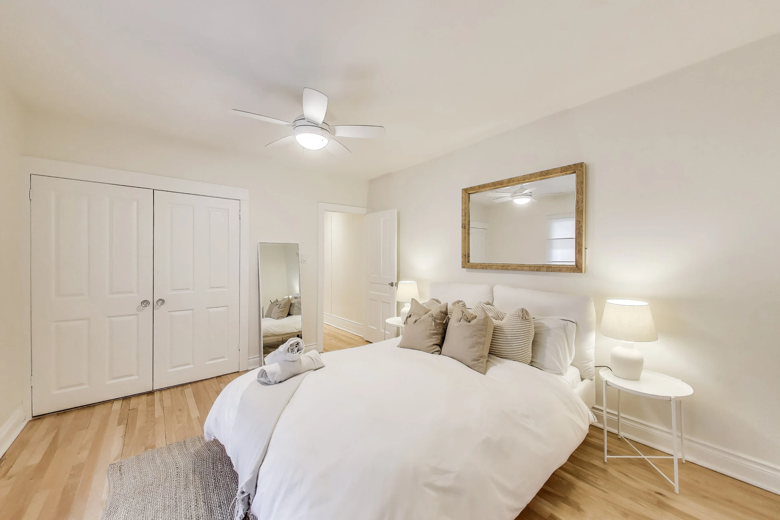 Cozy and spacious bedroom, offering comfortable bedding and a peaceful retreat after a day of golf or lakefront activities in Ontario’s cottage country.