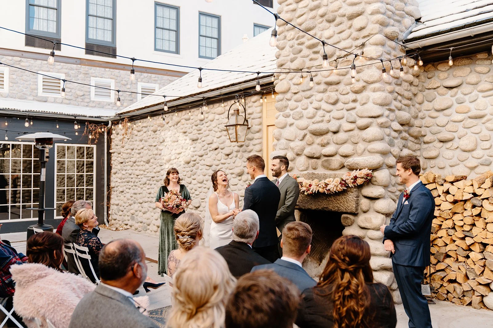 bride laughing during a wedding ceremony at the surf hotel in buena vista, co