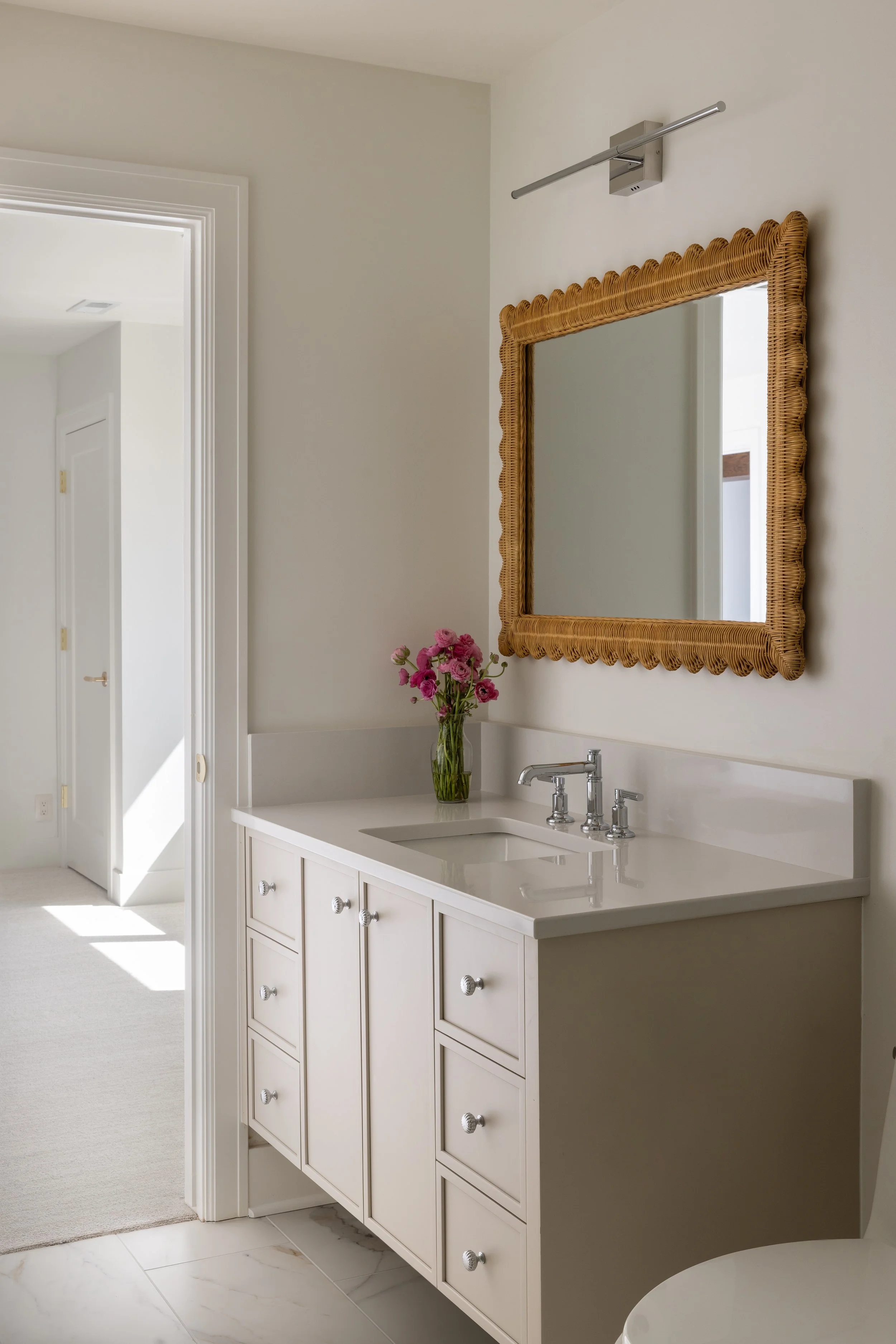 14-Katherine-Josephine-Designs-Bath-Remodel-Luxury-Hardware-Rattan-Mirror.jpg