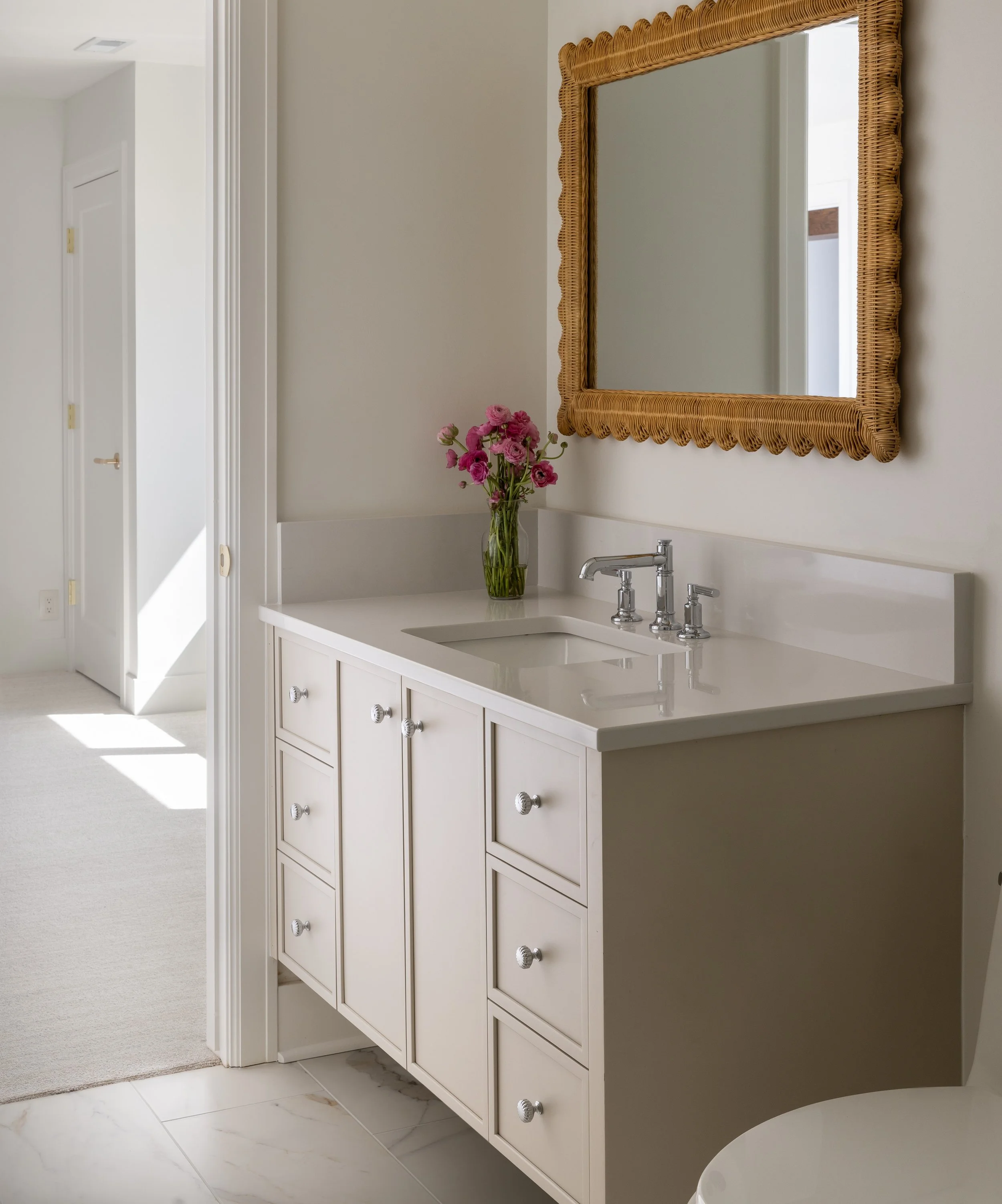 14-Katherine-Josephine-Designs-Bath-Remodel-Luxury-Hardware-Rattan-Mirror.jpg