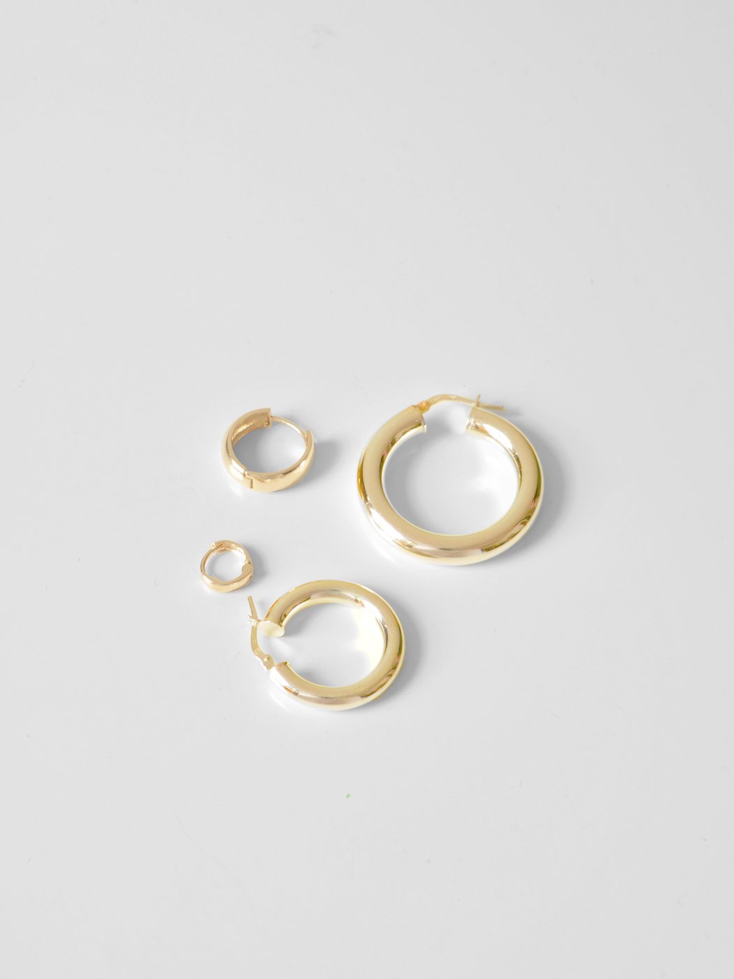 Lightweight hinged clasp tube hoop earrings in 14k yellow gold or sterling silver