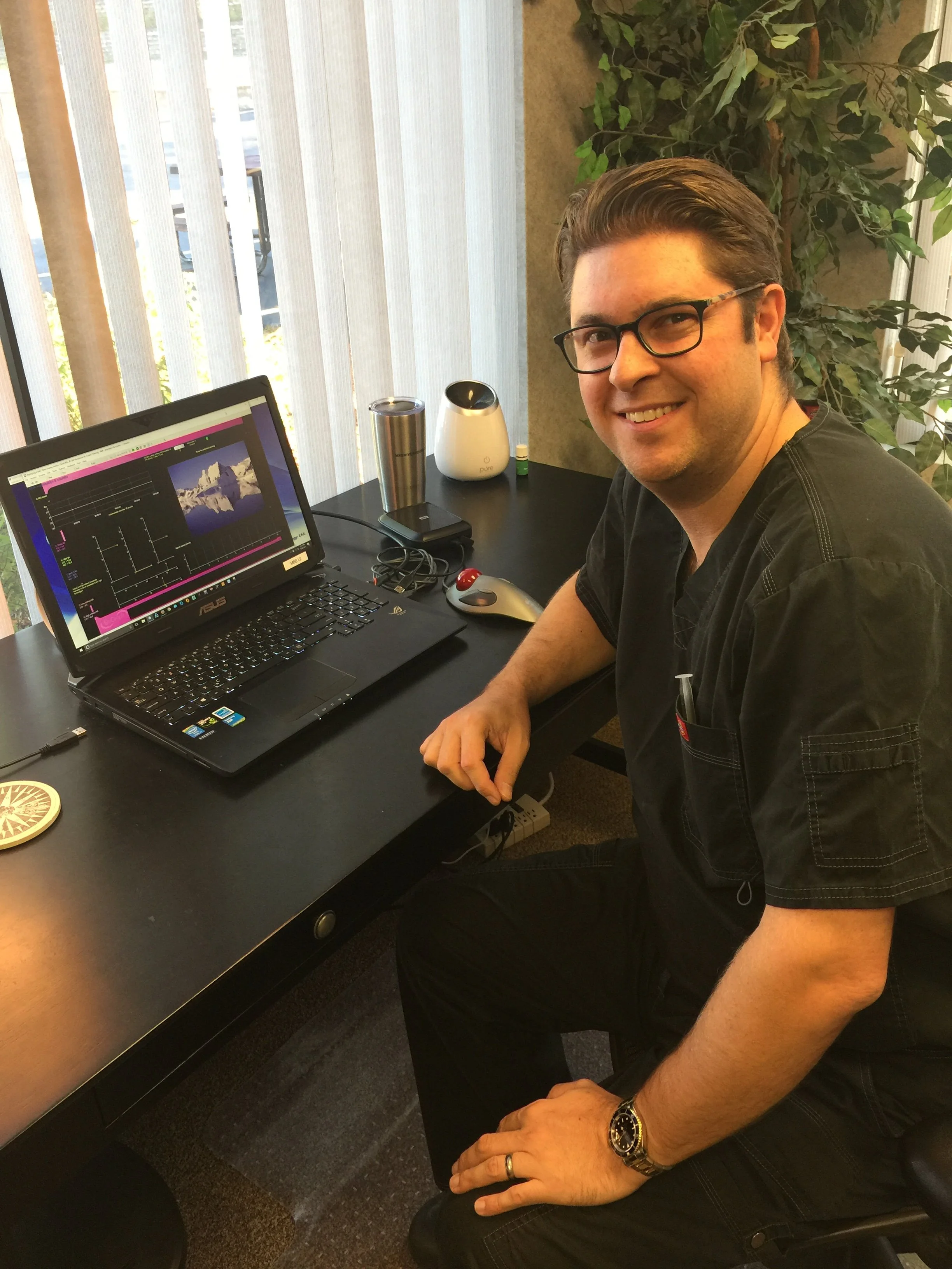Dr. Kyle Ferroly, circa 2018, in the Delafield office, where he offered Neurofeedback, Biofeedback, and QEEG Brain Mapping in Wisconsin.