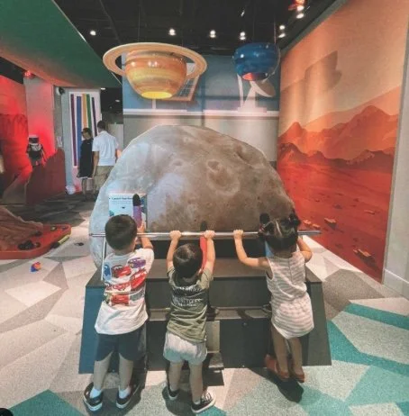 3 kids and rock.jpg